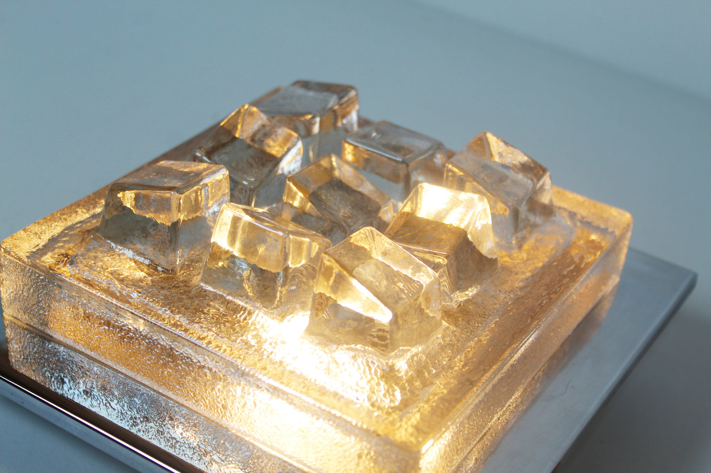 Single 1970's Brutalist glass wall sconce by Hillebrand