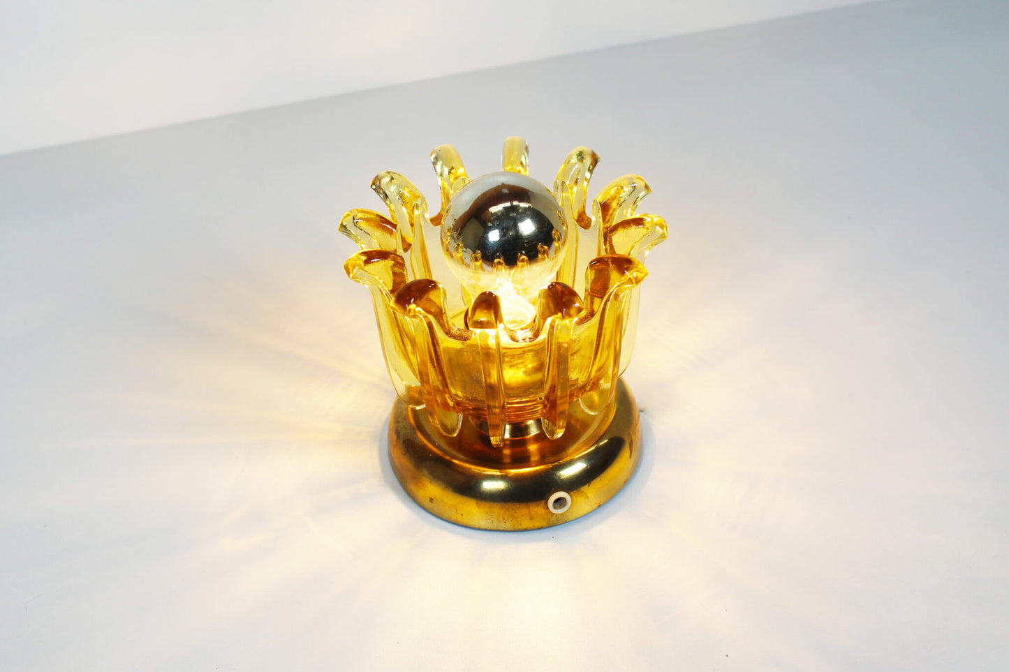 Pair brass & amber glass wall lights by Leclaire & Shaffer