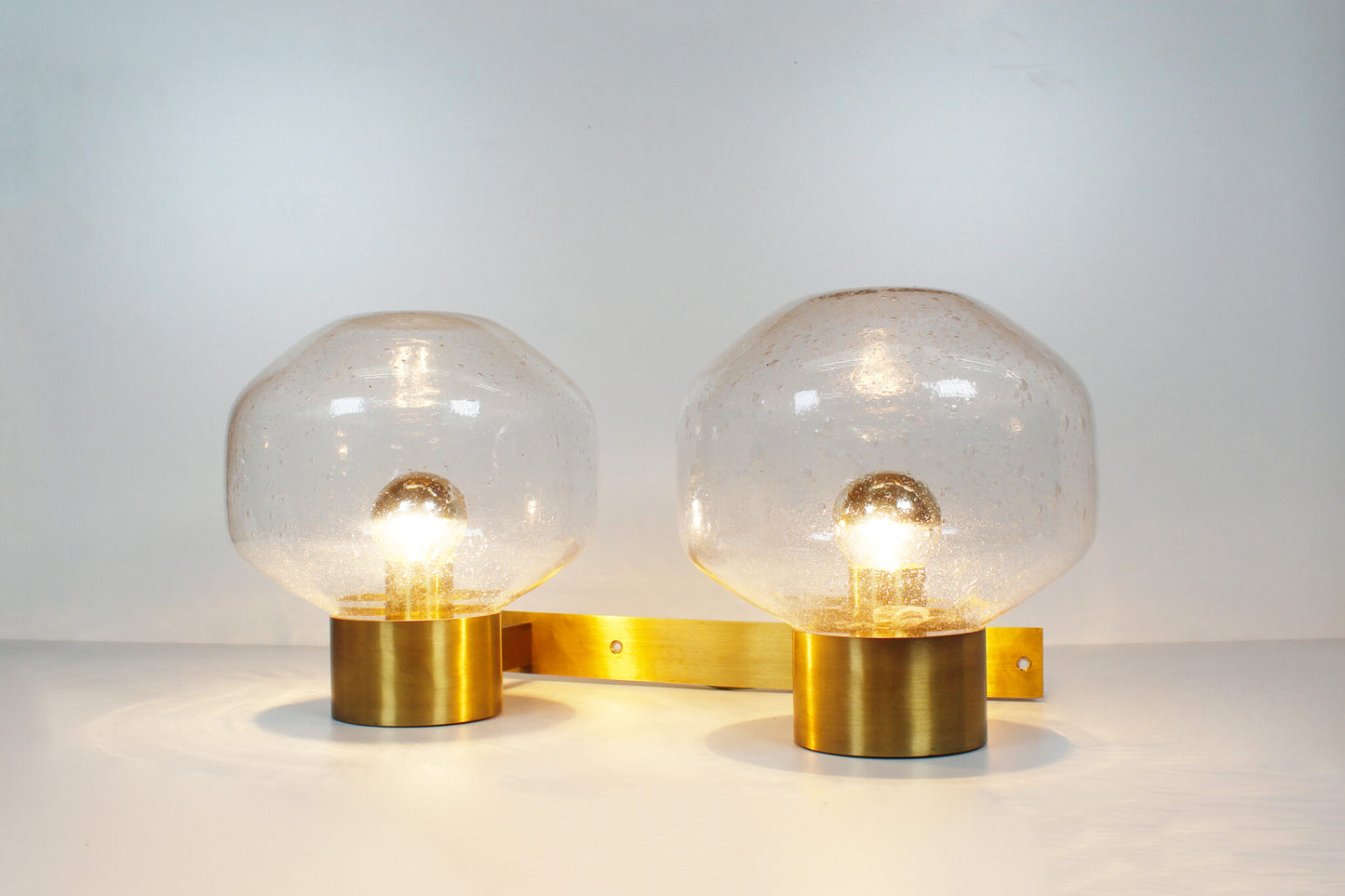 Large brass and mouth blown glass wall light by Doria Leuchten