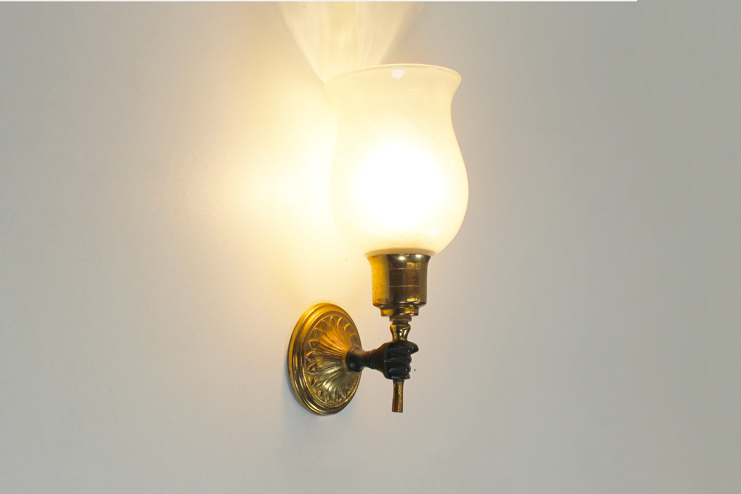 Pair of 'torch' wall lamps in the style of Maison Jansen