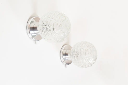 Pair of vintage chrome wall lamps door Doria Leuchten