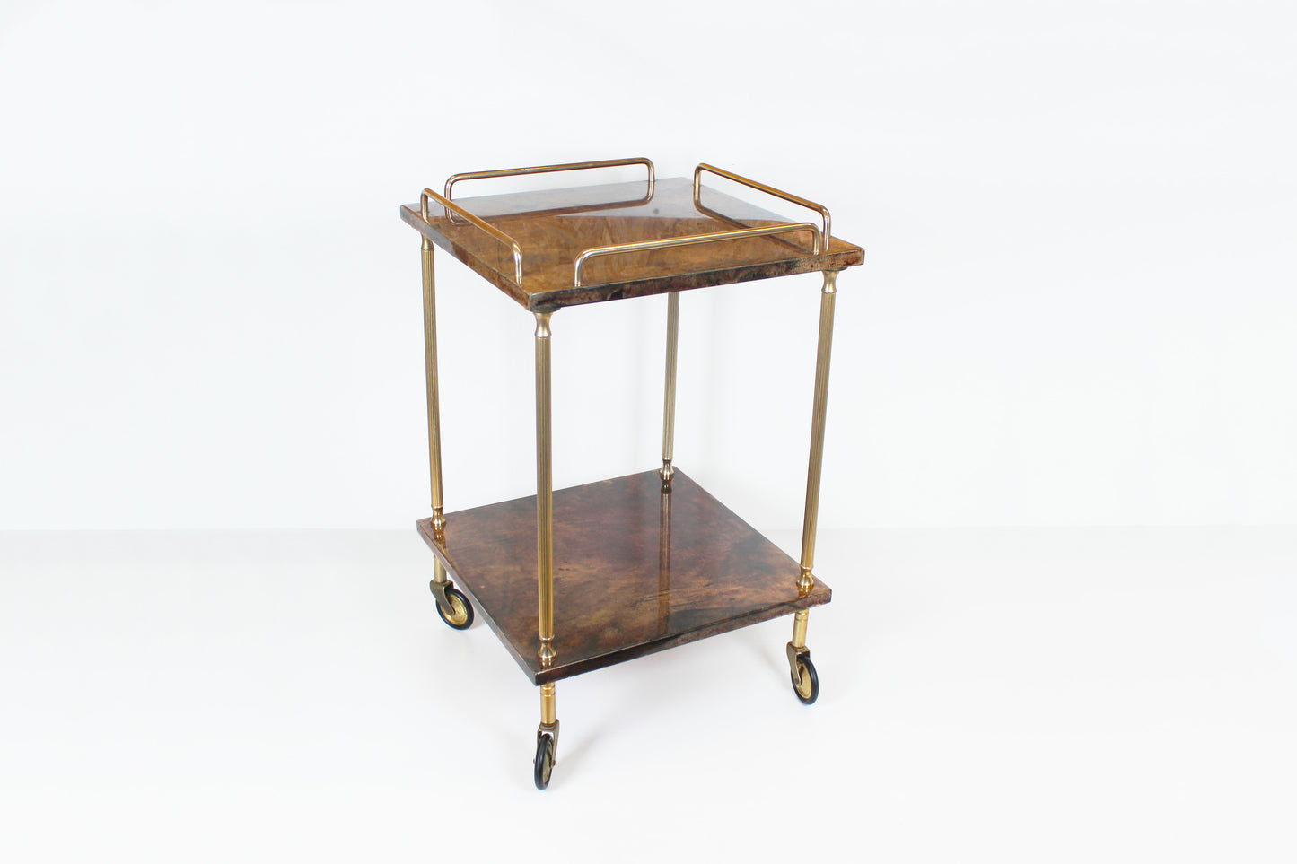 Vintage serving trolley in brass and lacquered goatskin by Aldo Tura