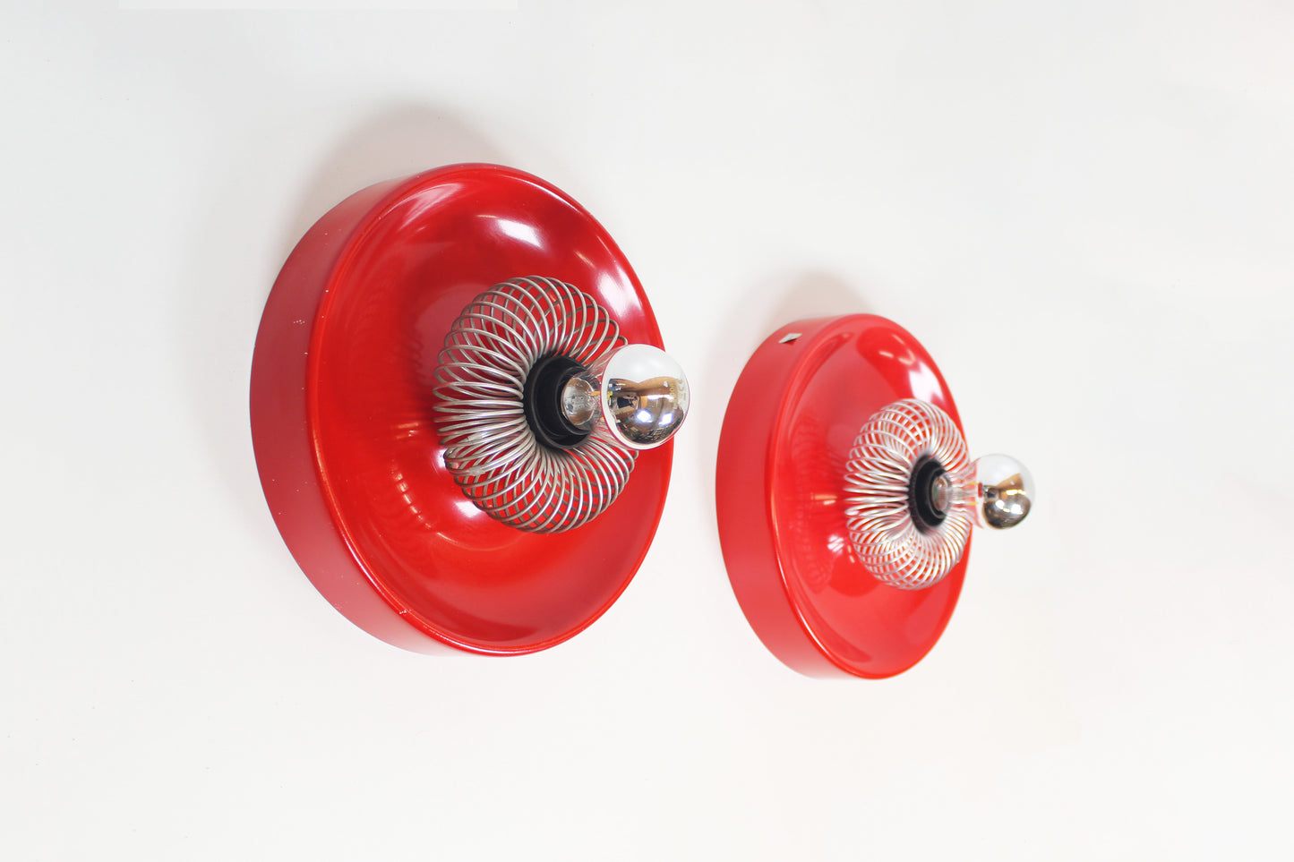 Pair of Space Age 'Spring' wall lamps by ELEKTROFÉM, Hungary, 1970s.