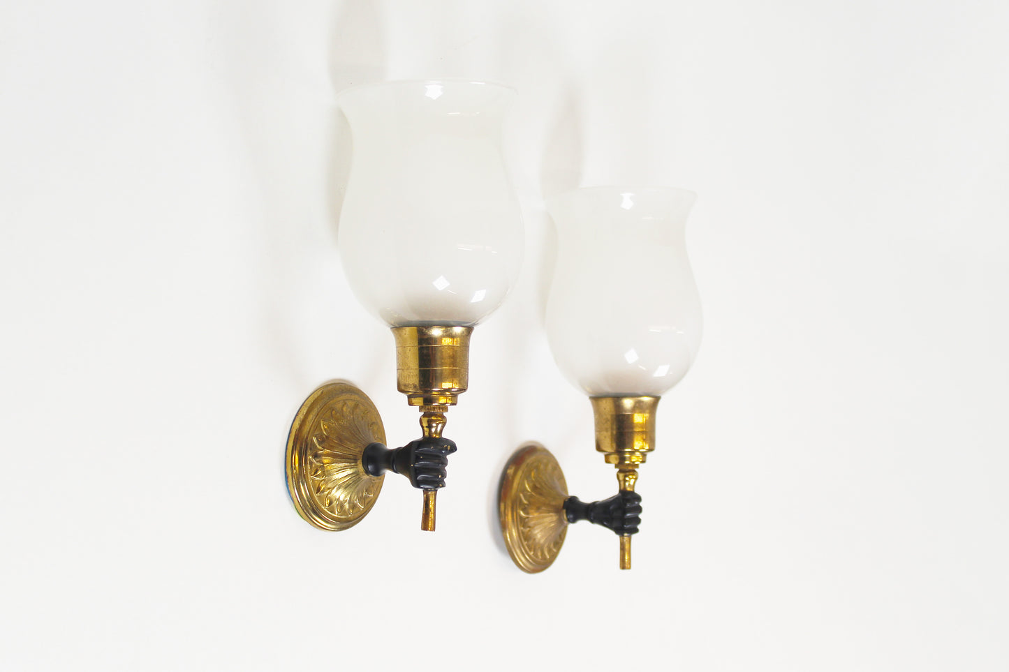 Pair of 'torch' wall lamps in the style of Maison Jansen