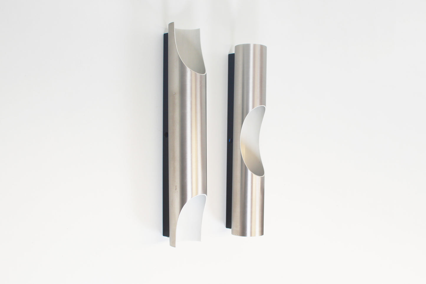 Pair of 70s 'FUGA' wall lamps by RAAK