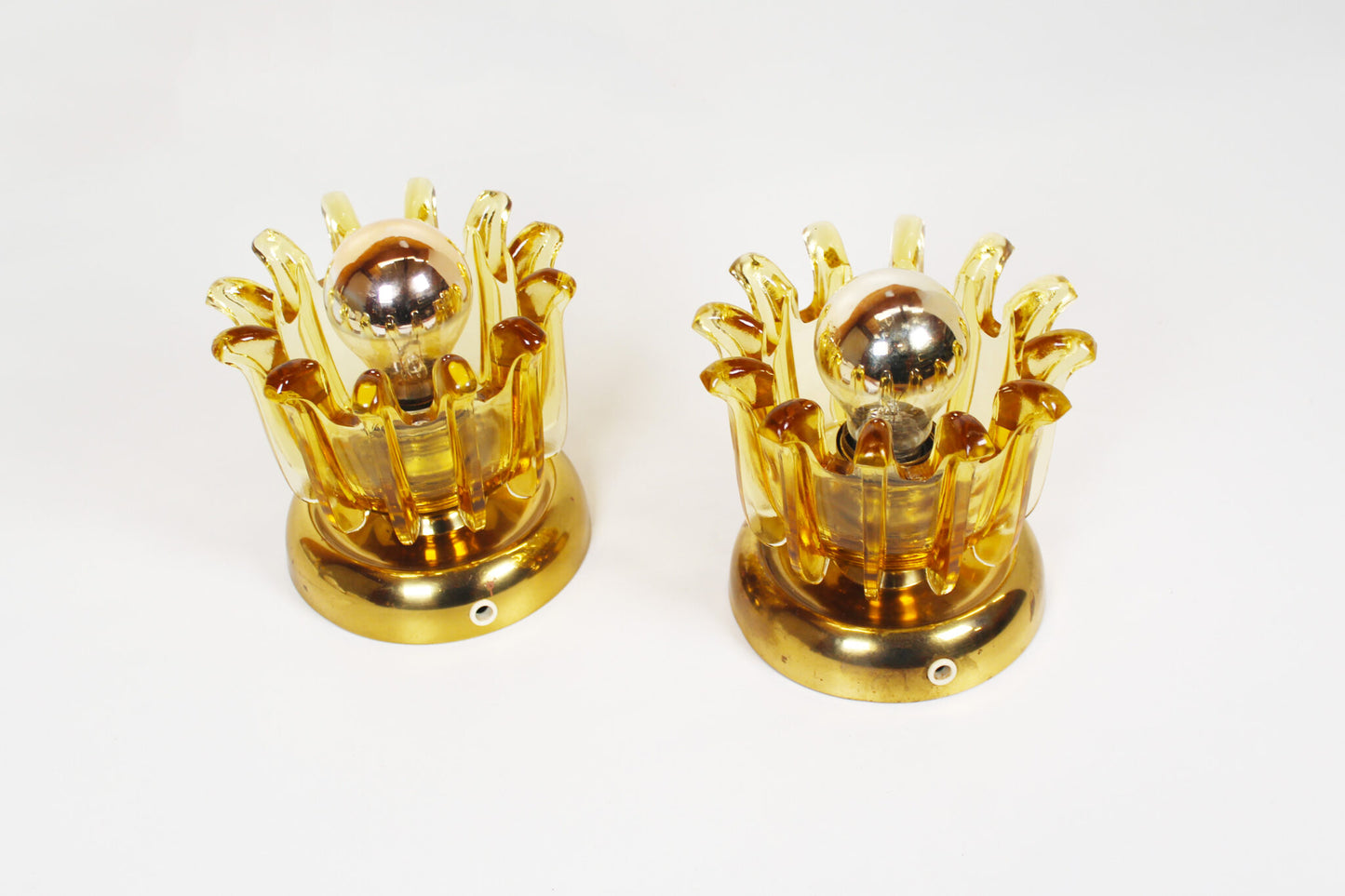 Pair brass & amber glass wall lights by Leclaire & Shaffer