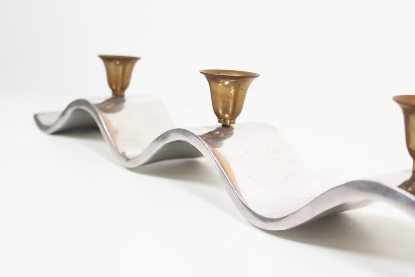 Brutalist candlestick in aluminium, attributed to David Marshall