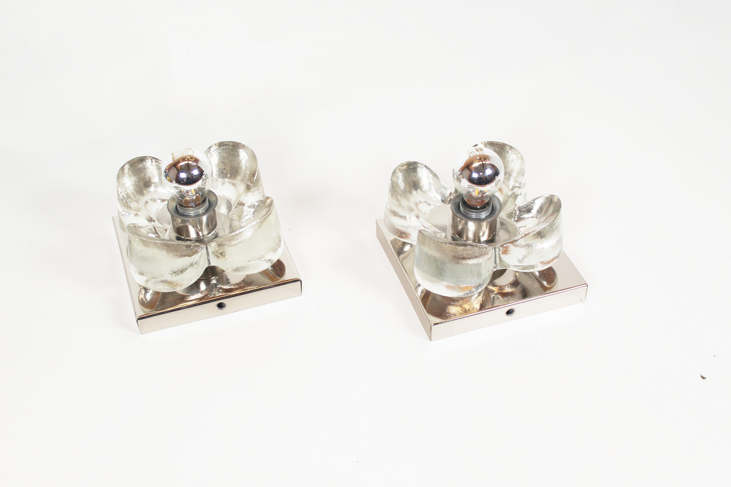 Pair of 1970's polished and glass wall lights by Sische