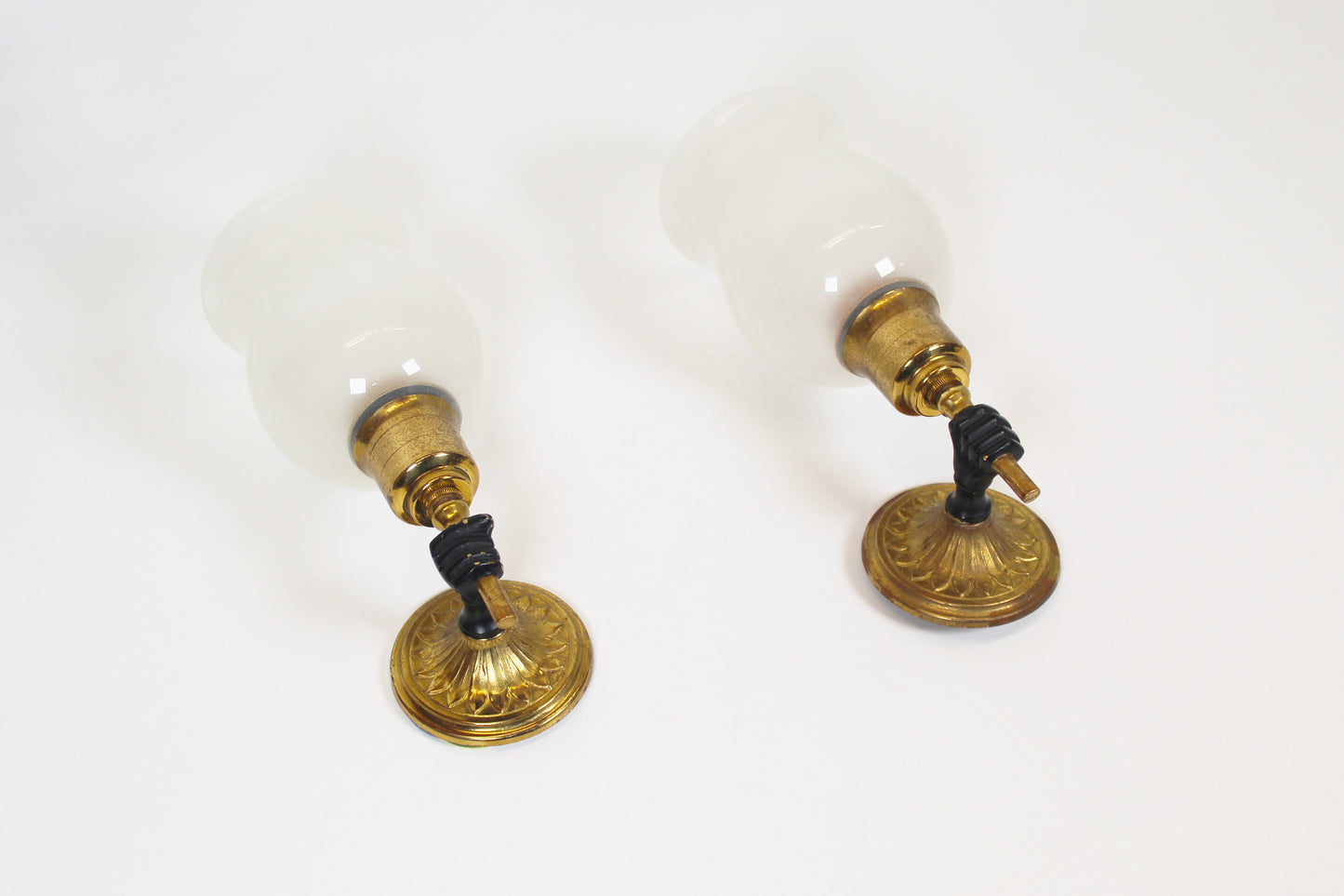 Pair of 'torch' wall lamps in the style of Maison Jansen