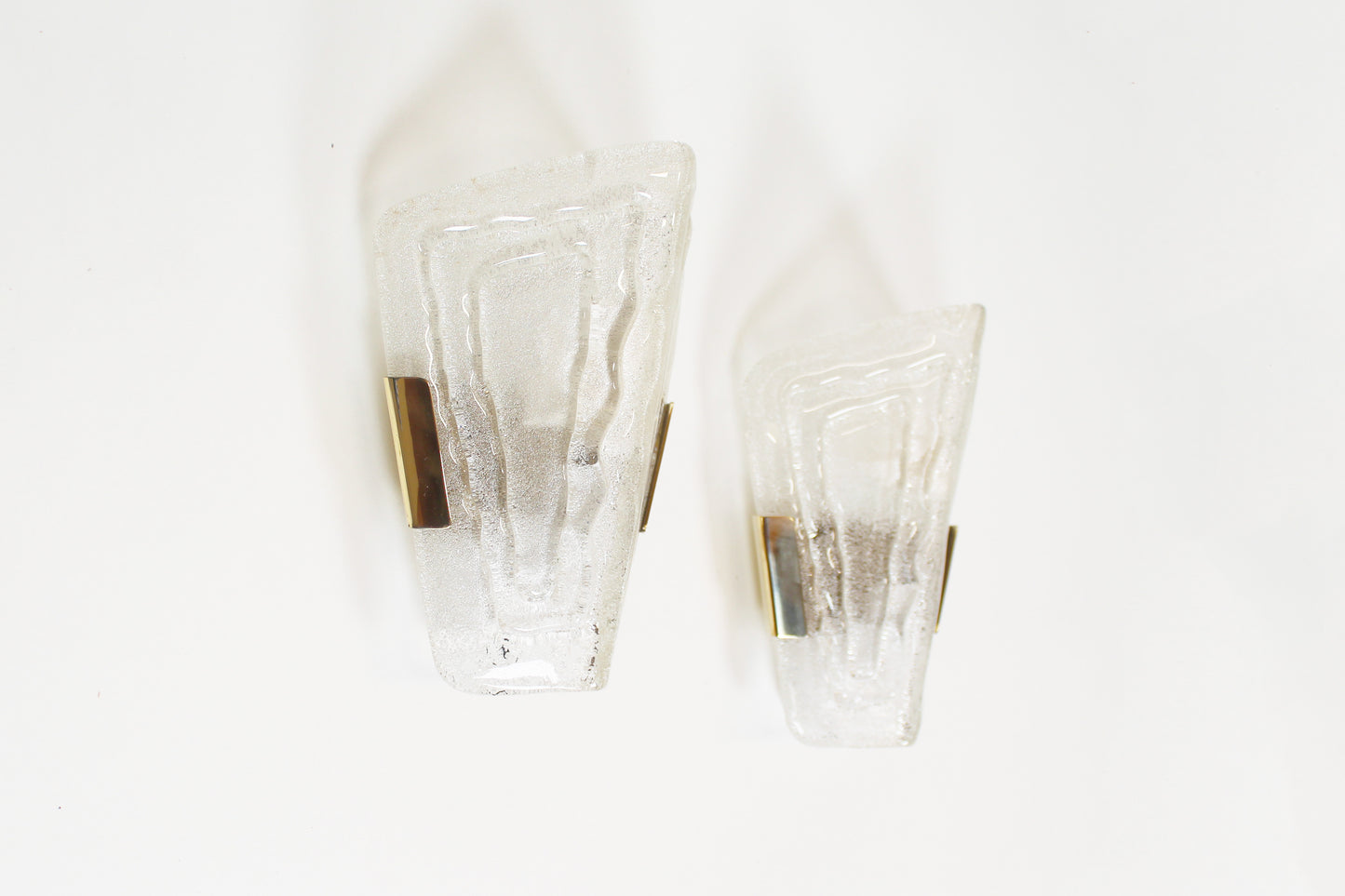 Pair of 1970s ice glass and brass wall lamps by Hillebrand