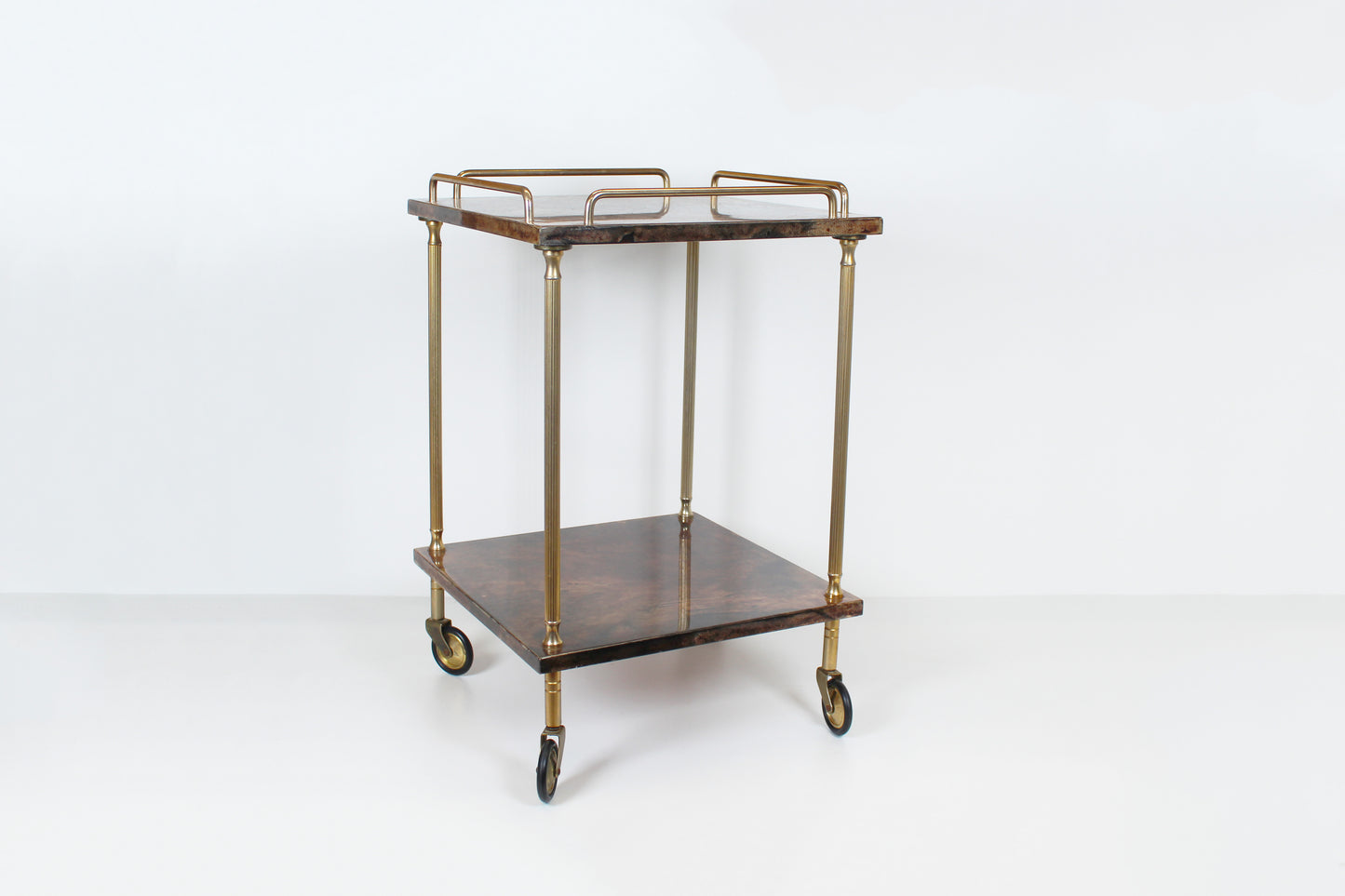 Vintage serving trolley in brass and lacquered goatskin by Aldo Tura