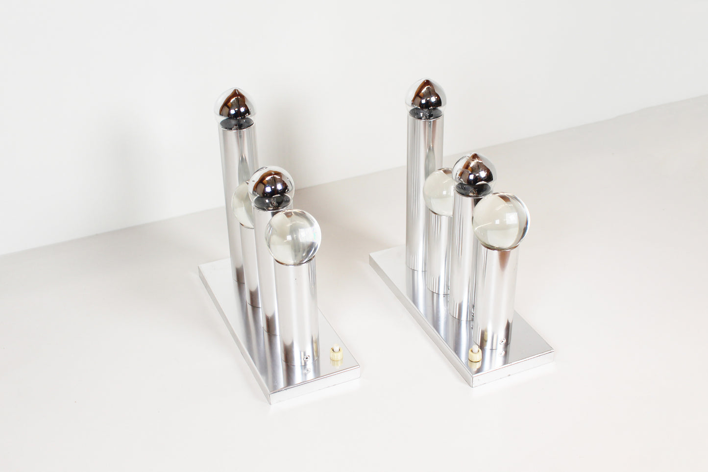 Set of polished wall lamps by Gaetano Sciolari