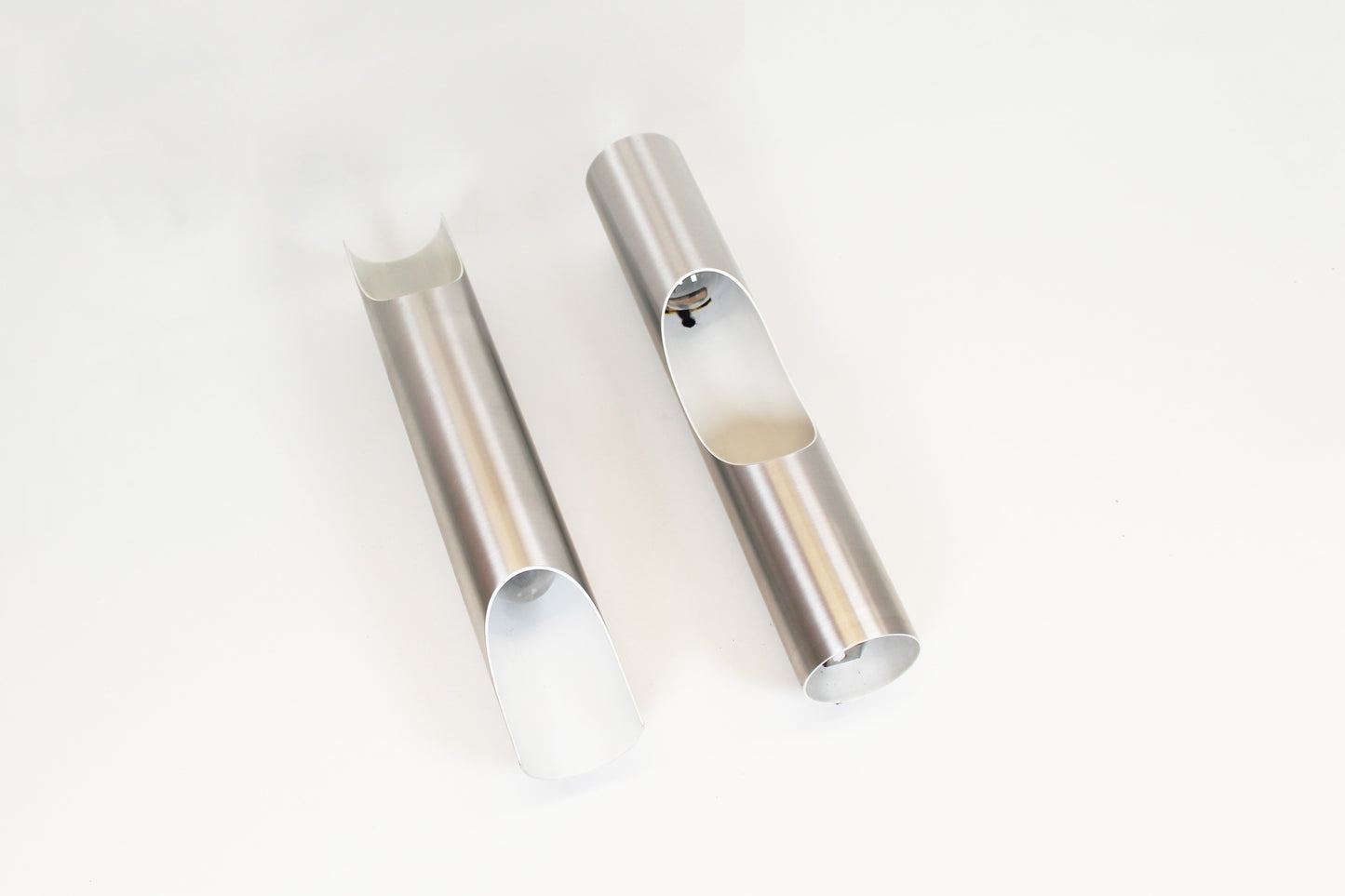 Pair of 70s 'FUGA' wall lamps by RAAK