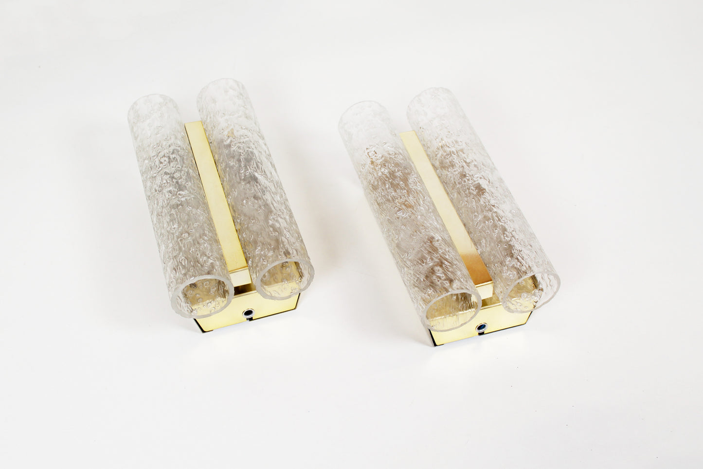 Pair of wall lamps in brass plated metal and glass by Doria Leuchten