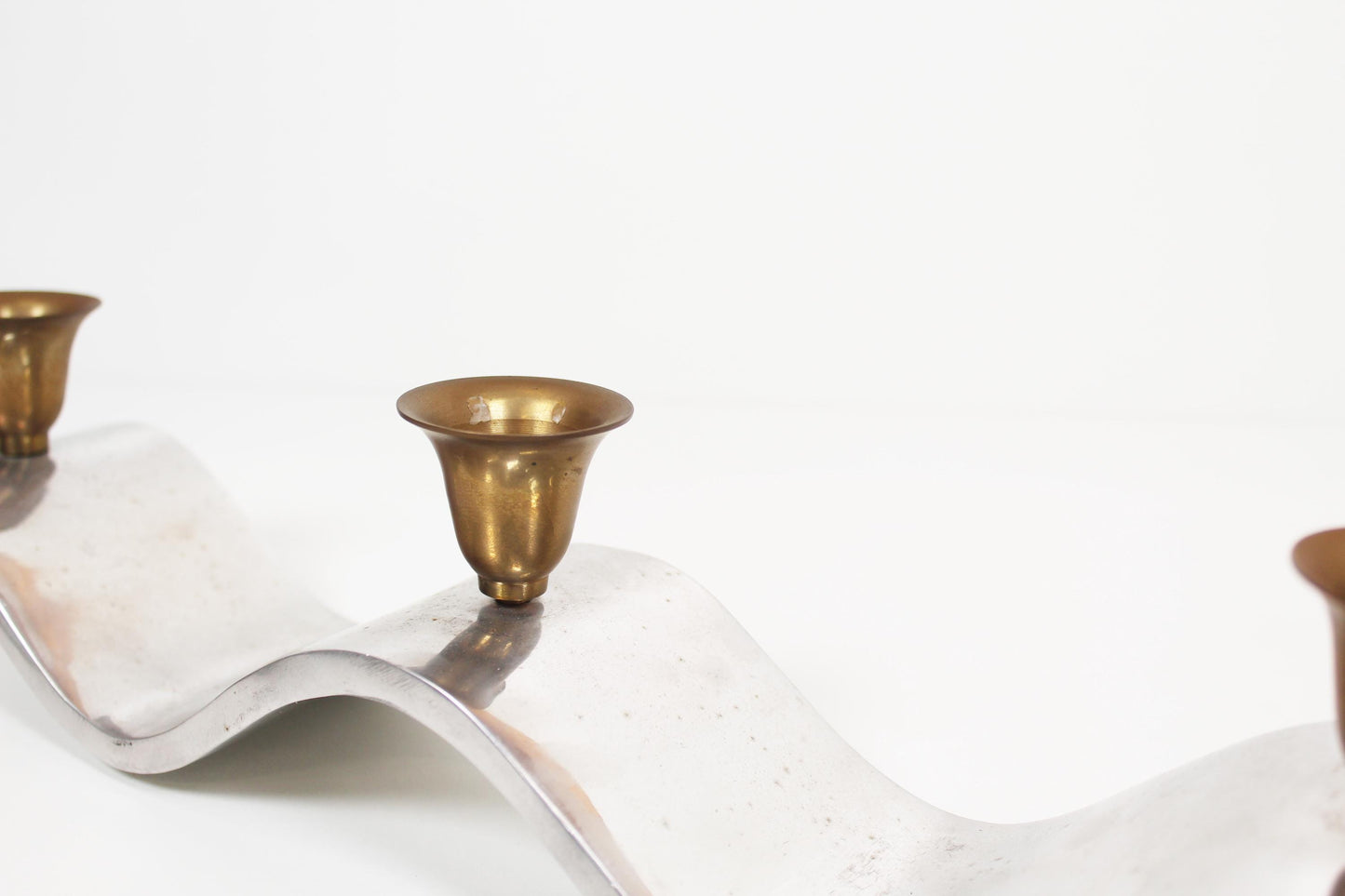 Brutalist candlestick in aluminium, attributed to David Marshall