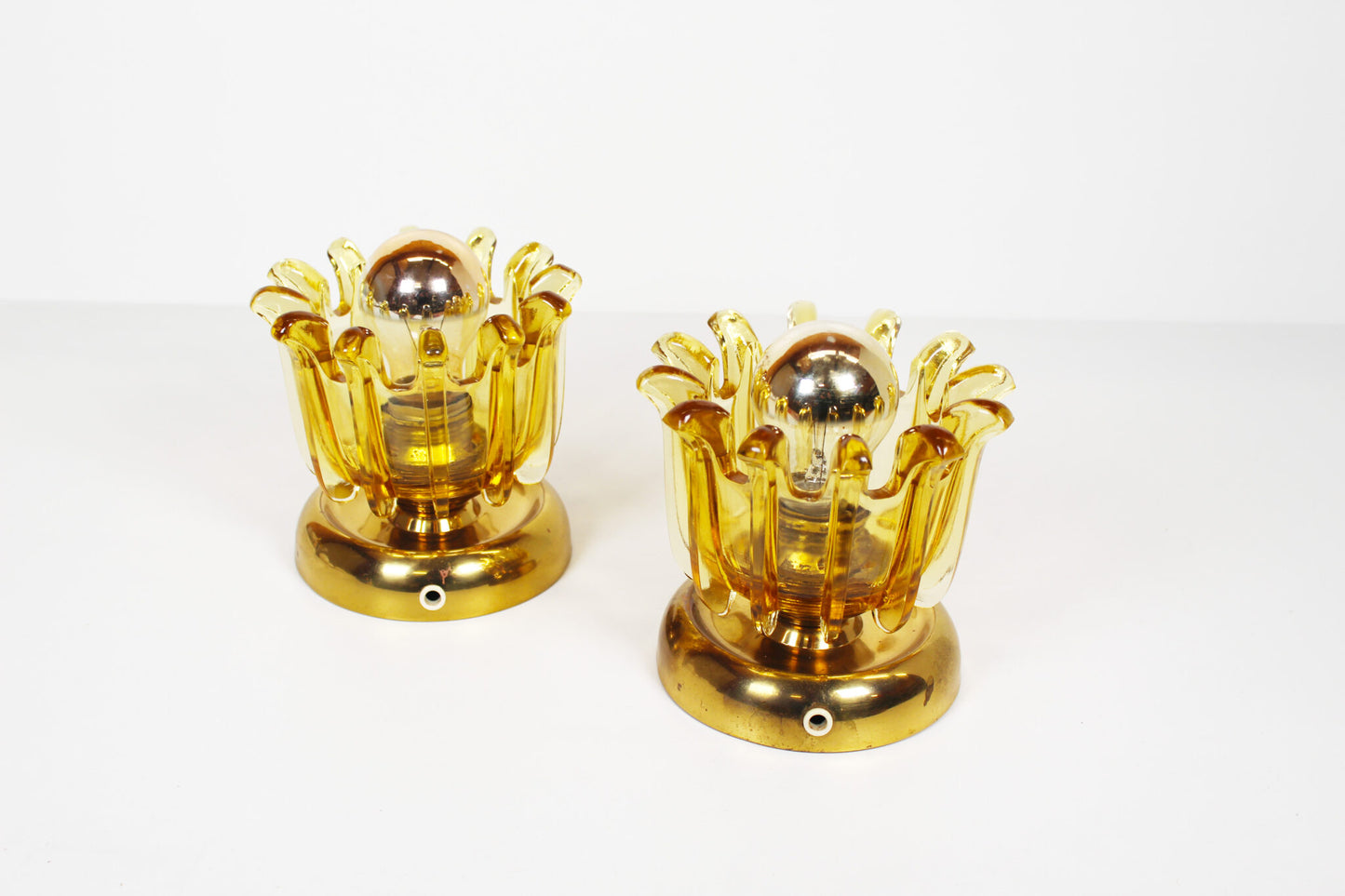 Pair brass & amber glass wall lights by Leclaire & Shaffer