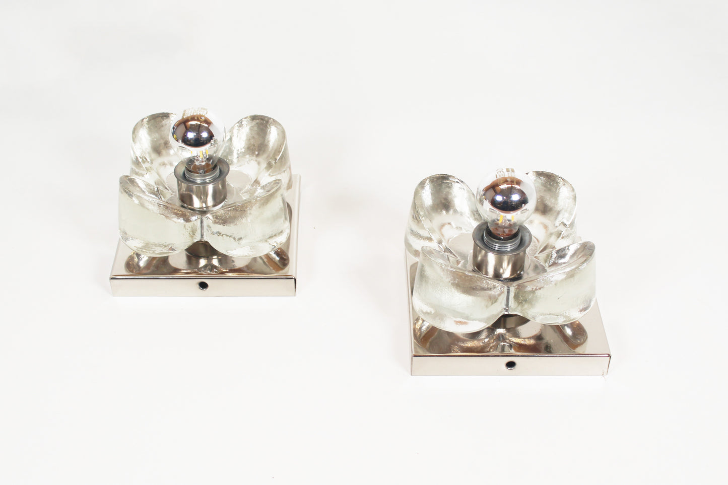 Pair of 1970's polished and glass wall lights by Sische