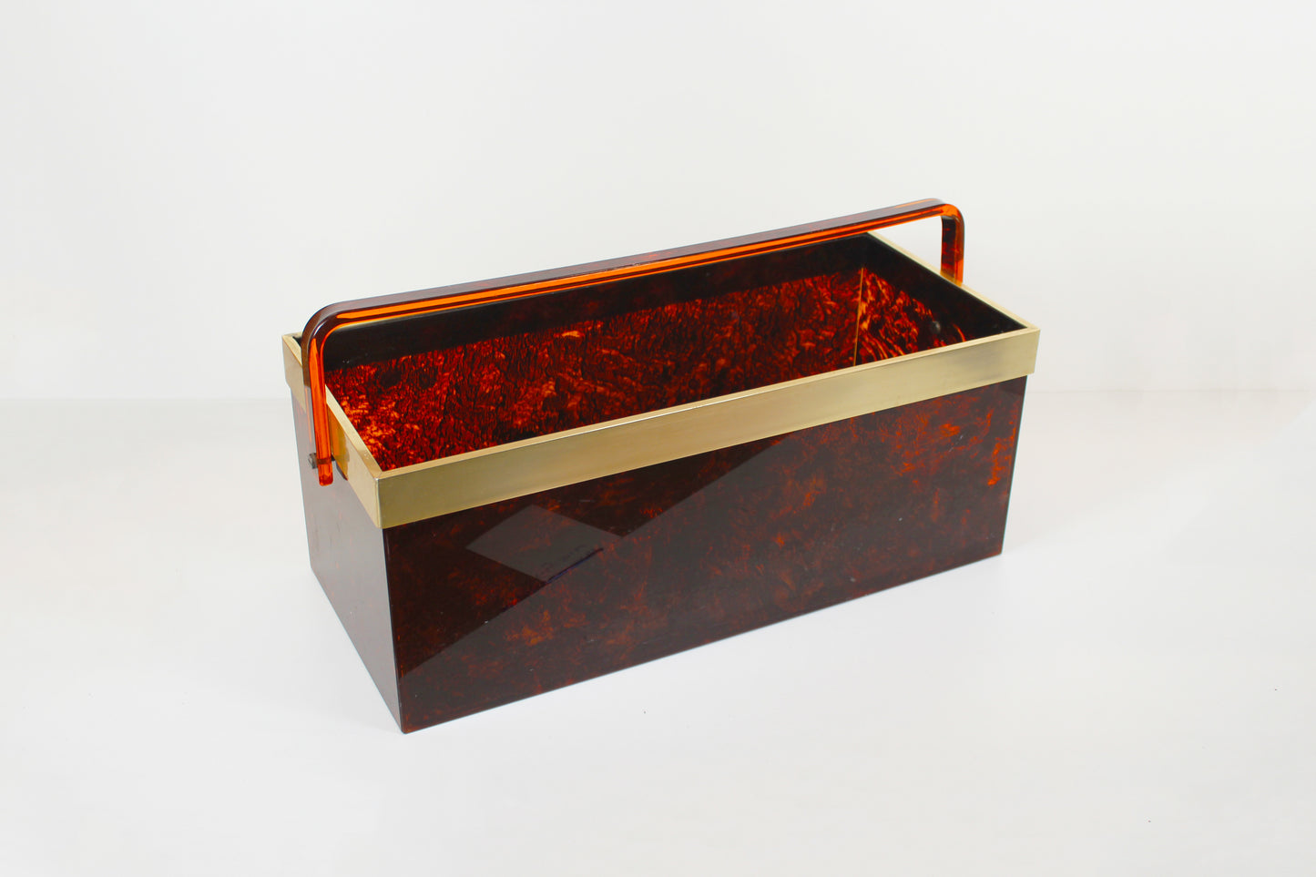 Italian magazine rack in 'faux tortoiseshell' and brass