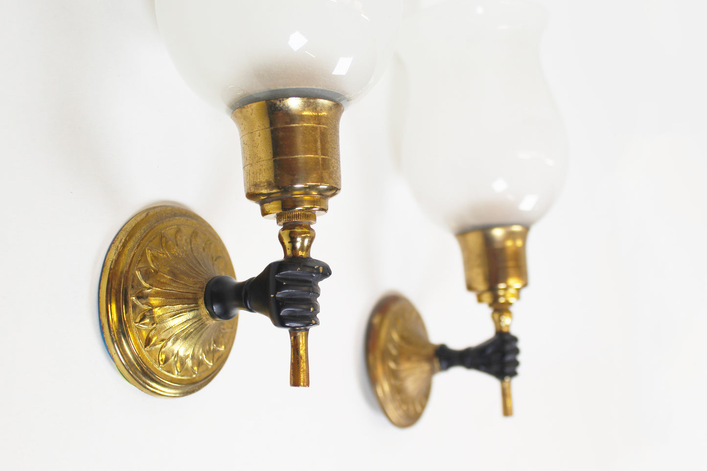 Pair of 'torch' wall lamps in the style of Maison Jansen