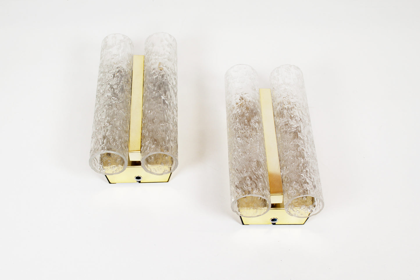 Pair of wall lamps in brass plated metal and glass by Doria Leuchten