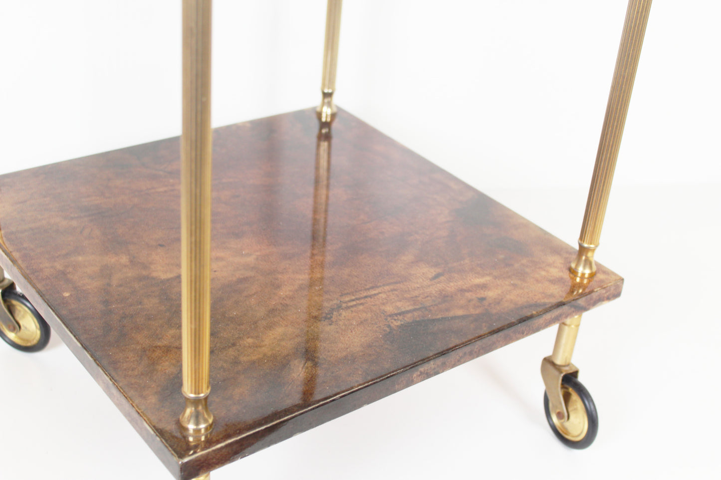 Vintage serving trolley in brass and lacquered goatskin by Aldo Tura