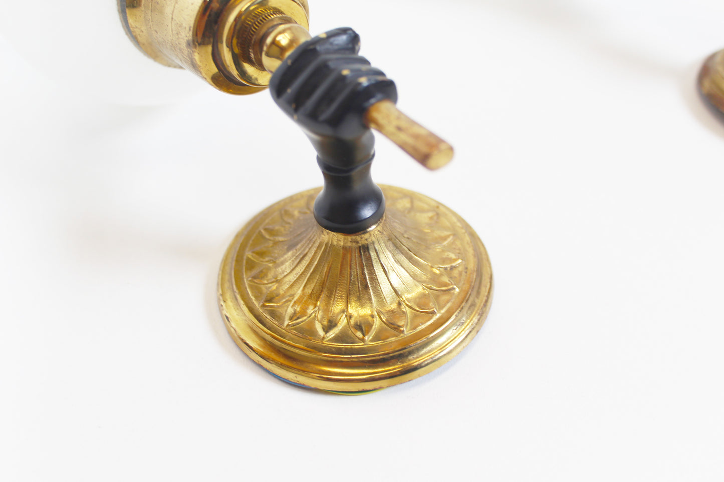 Pair of 'torch' wall lamps in the style of Maison Jansen