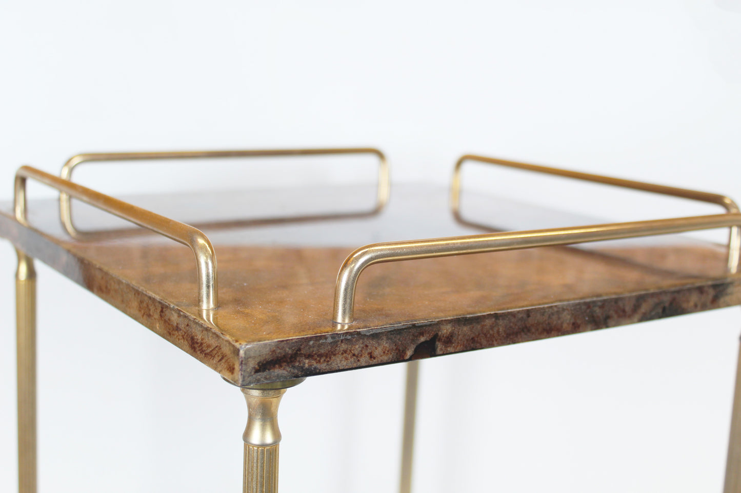 Vintage serving trolley in brass and lacquered goatskin by Aldo Tura
