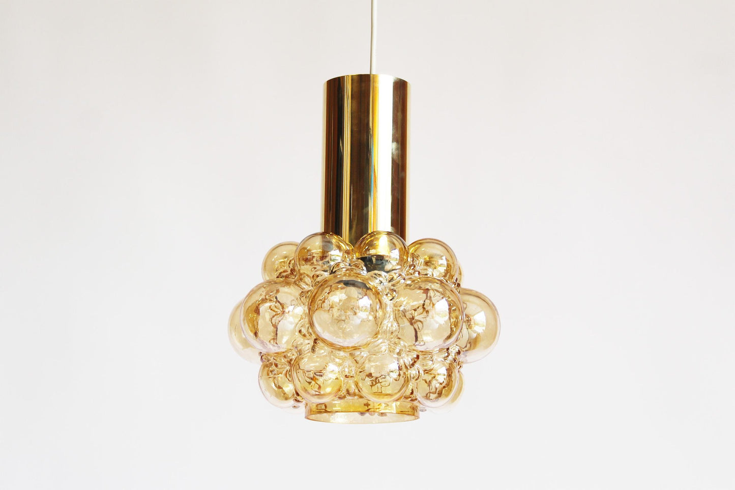Amber glass pendant lamp by Helena Tynell for Glashutte Limburg