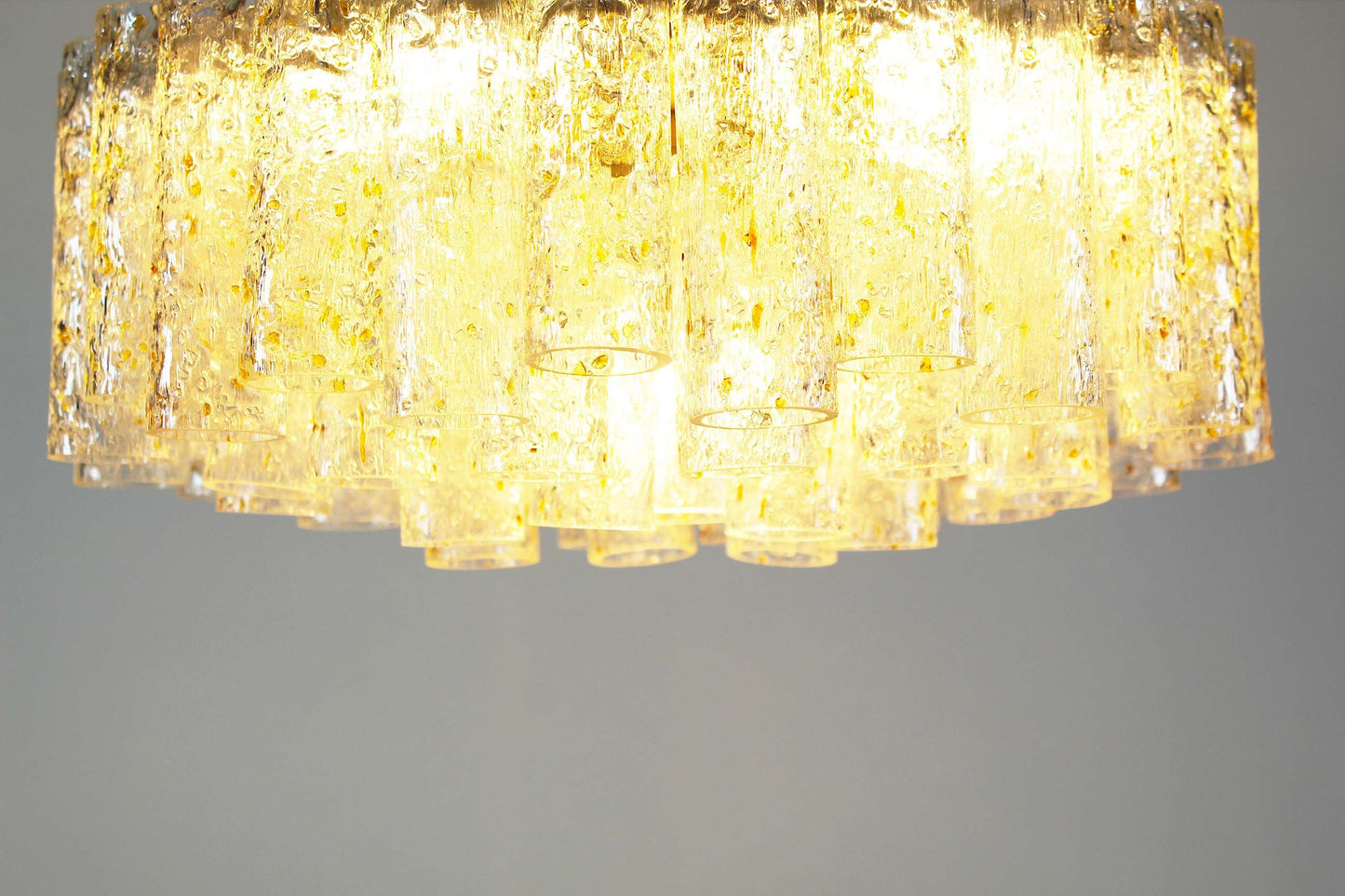 Large chandelier in brass and 'goldflake' glass by Doria Leuchten