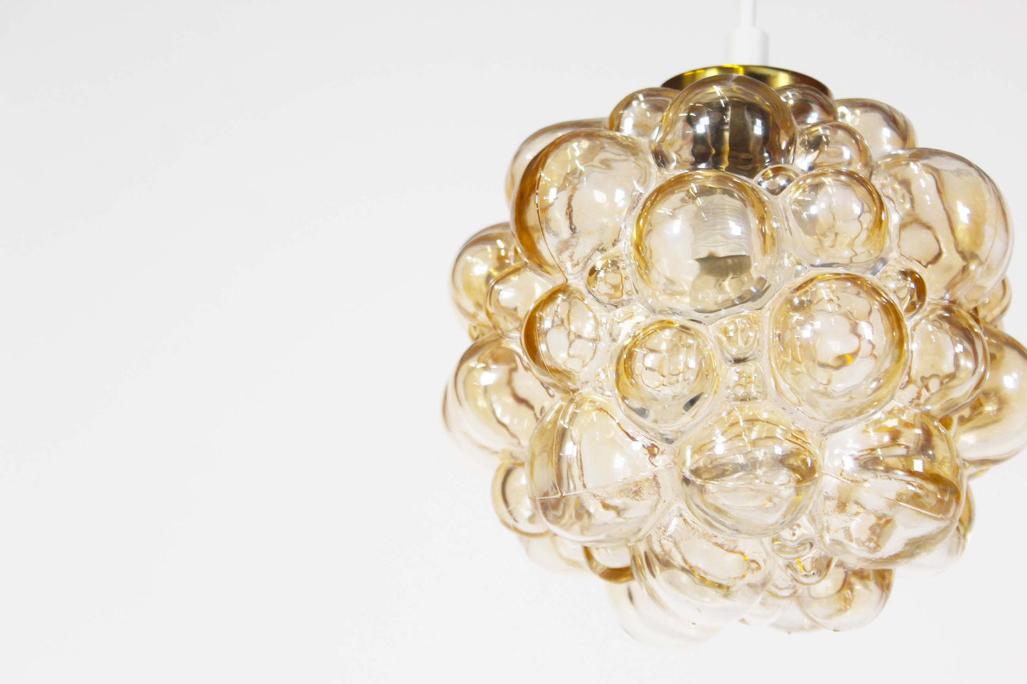 Amber glass 'bubble' pendant lamp by Helena Tynell for Glashutte Limburg