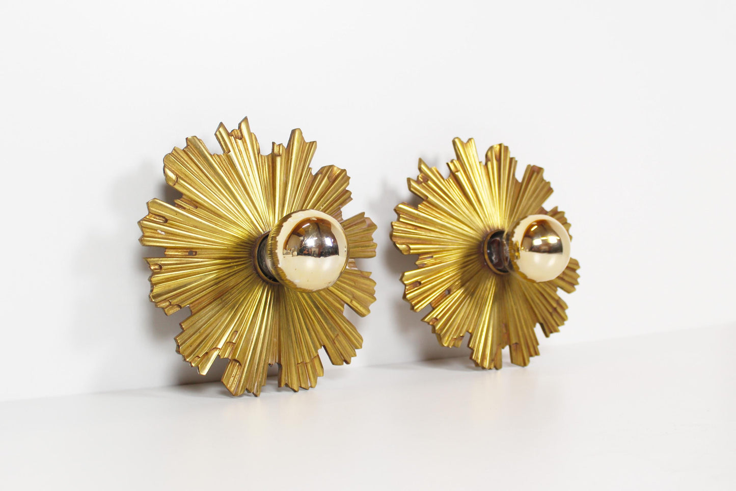 Set of solid bronze 1950s Sunburst wall lamps