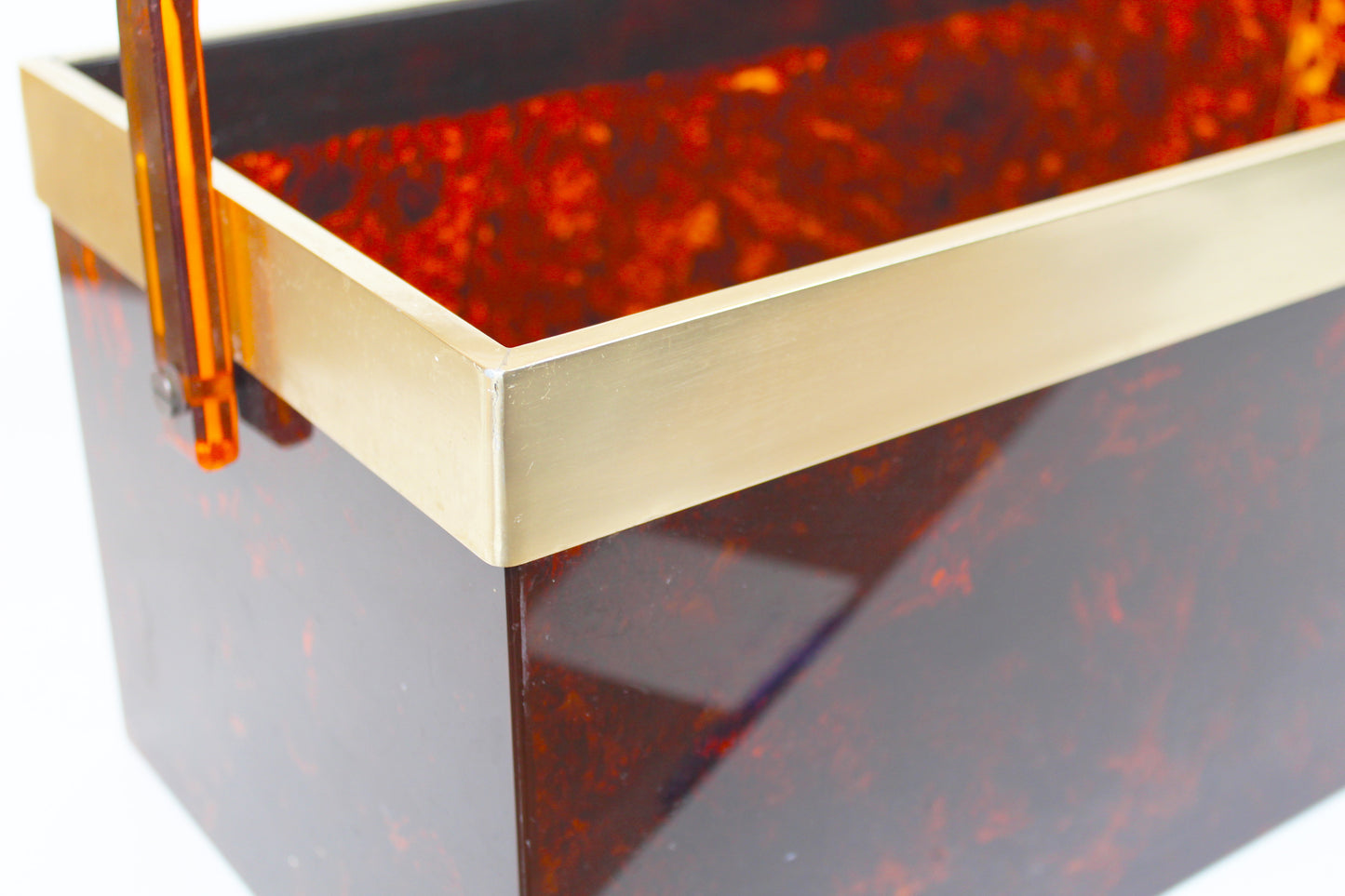 Italian magazine rack in 'faux tortoiseshell' and brass