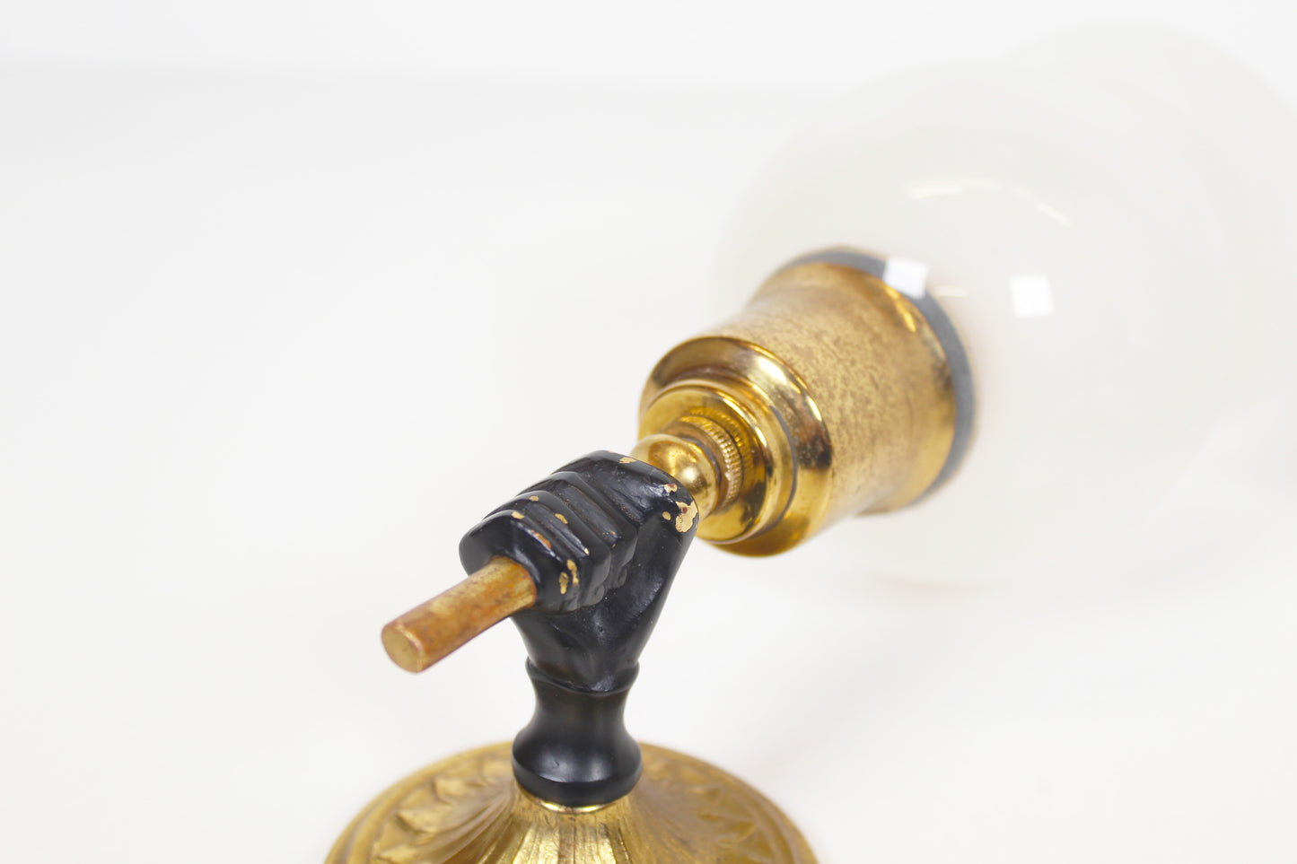 Pair of 'torch' wall lamps in the style of Maison Jansen