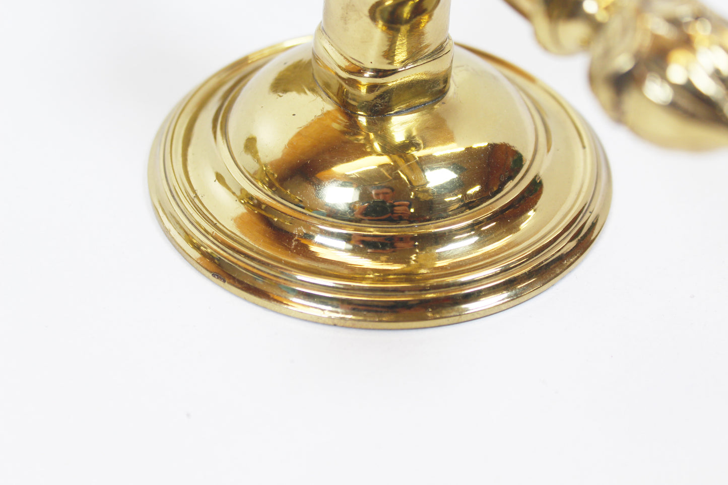Pair of 'torch' wall lamps in the style of Maison Jansen