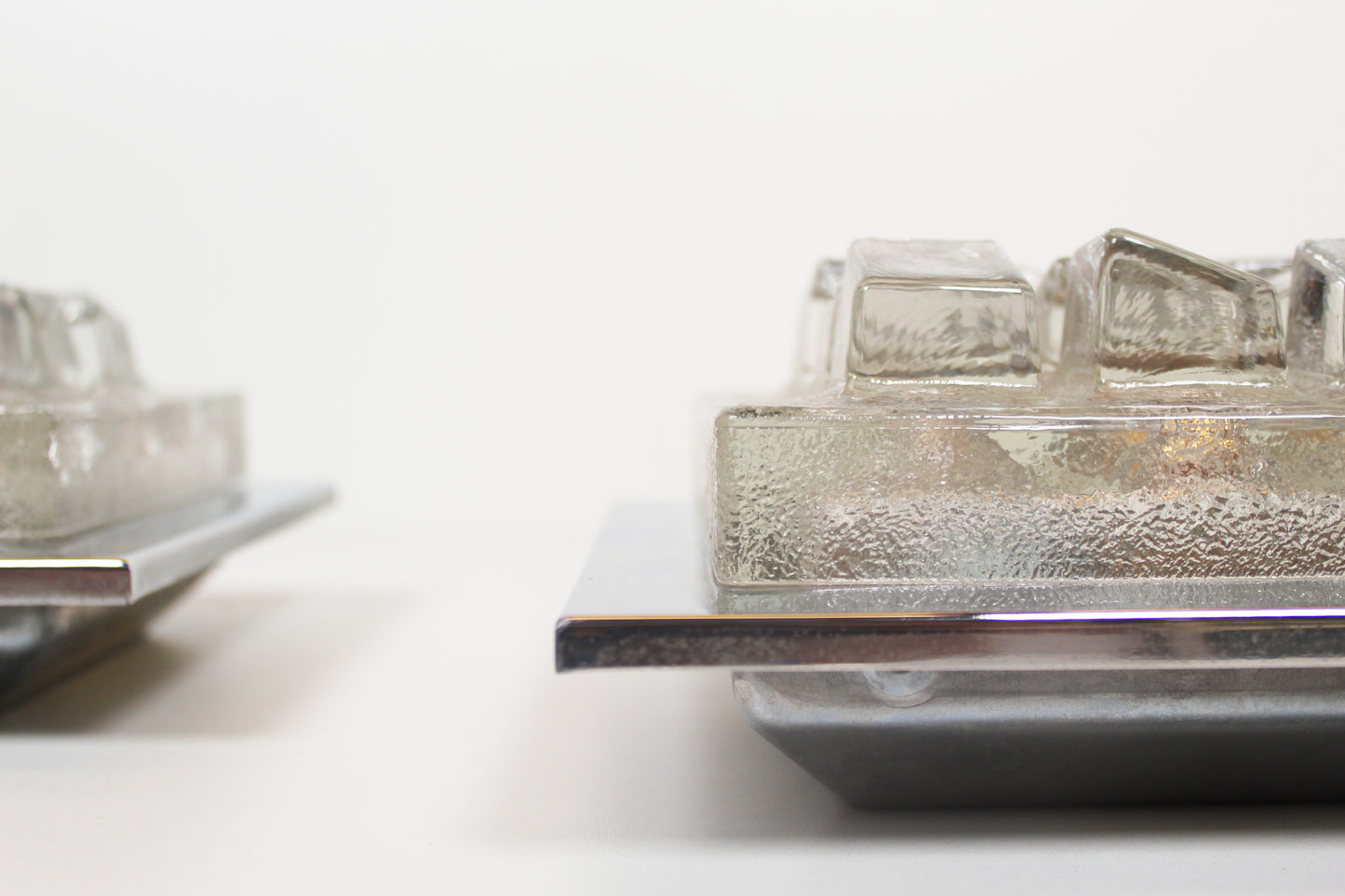 Pair of 1970's Brutalist glass wall sconces by Hillebrand