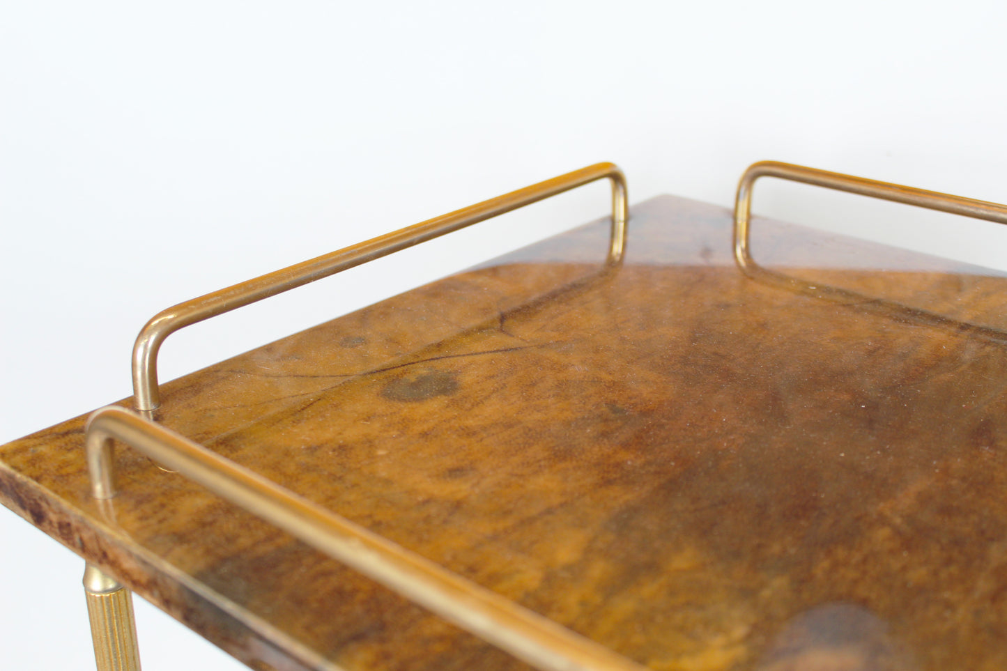 Vintage serving trolley in brass and lacquered goatskin by Aldo Tura