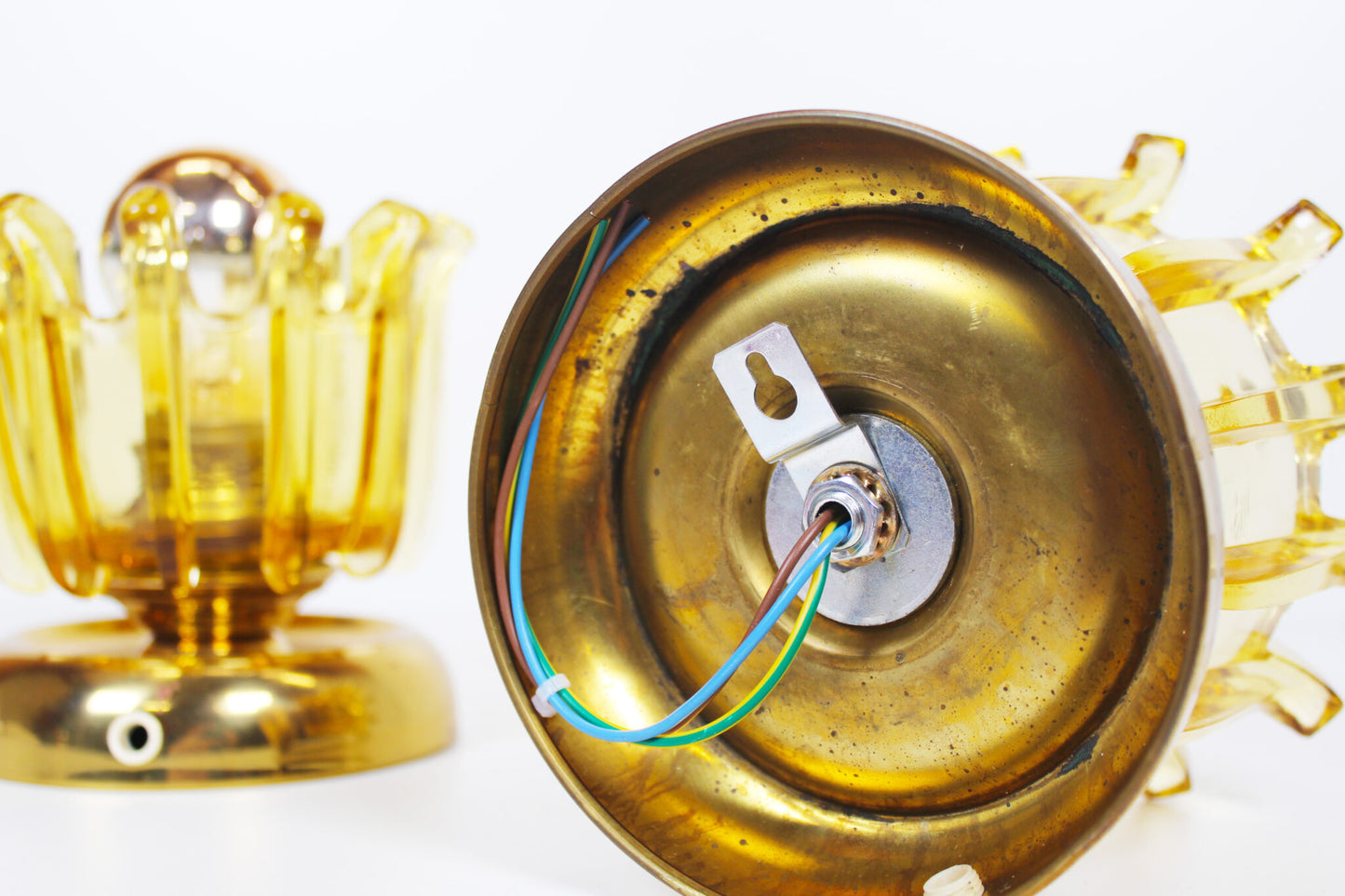 Pair brass & amber glass wall lights by Leclaire & Shaffer