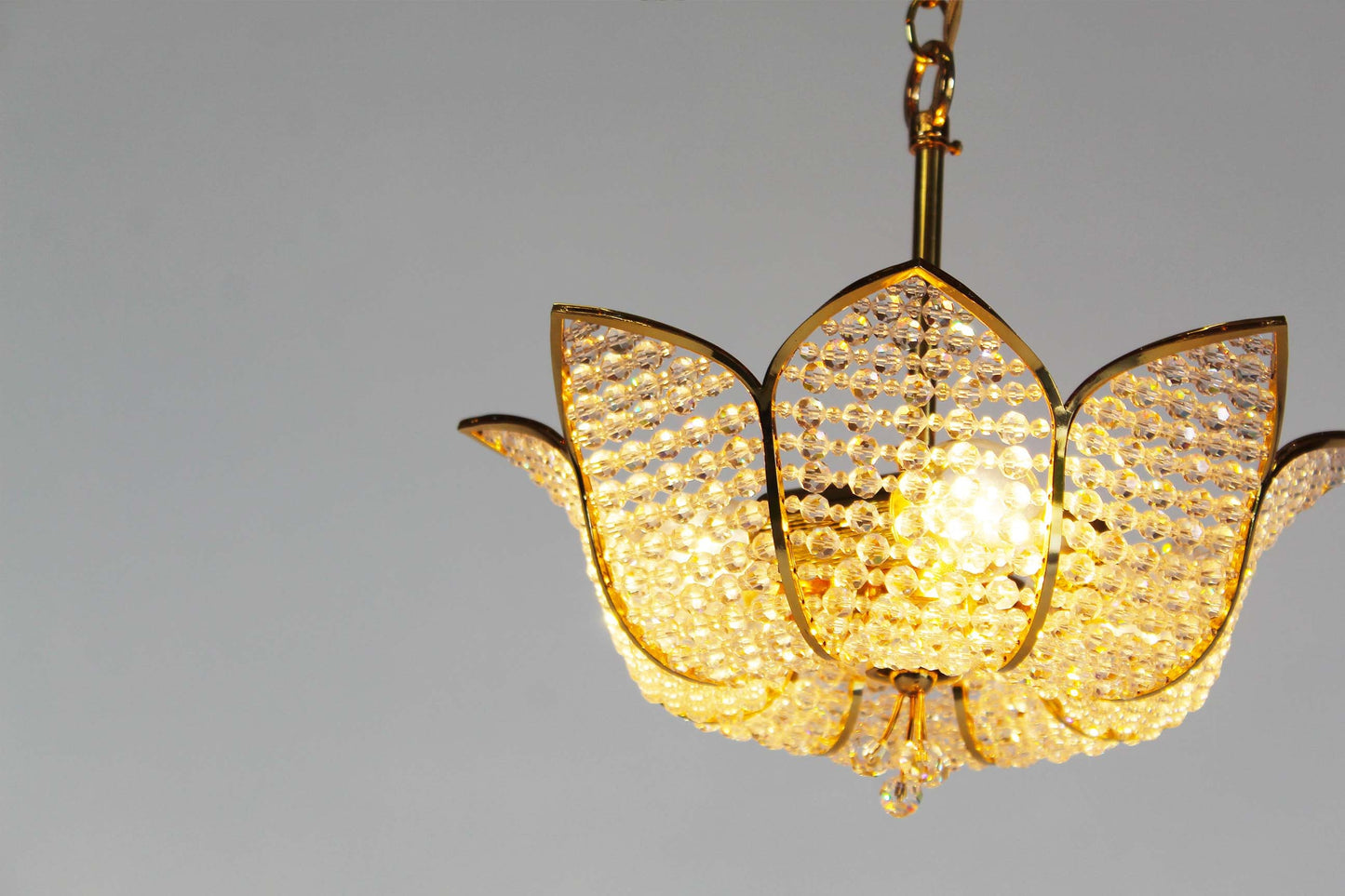 Chandelier in gilt brass and crystal glass by Palwa