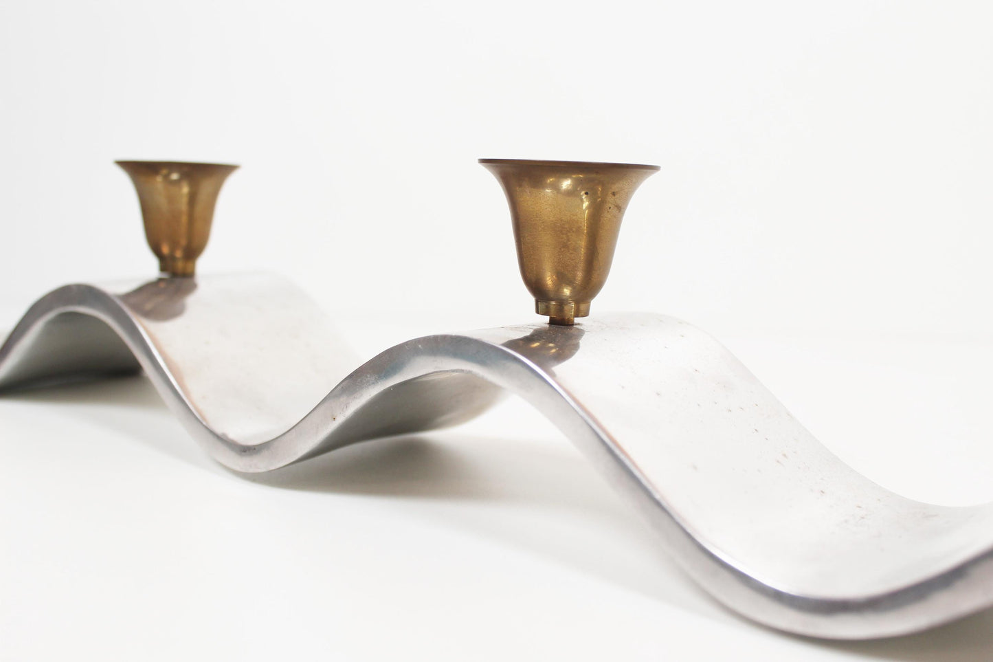Brutalist candlestick in aluminium, attributed to David Marshall
