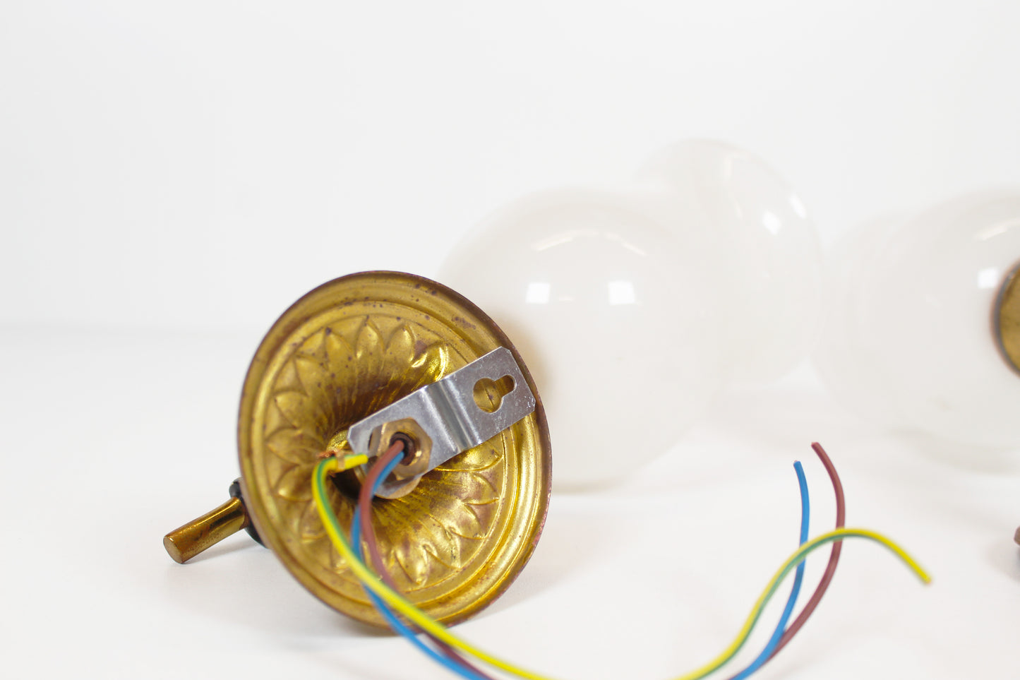 Pair of 'torch' wall lamps in the style of Maison Jansen