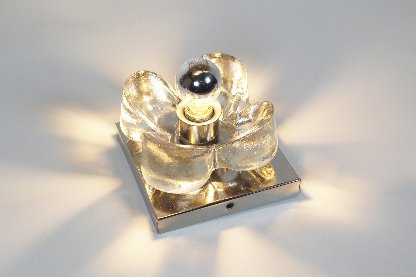 Pair of 1970's polished and glass wall lights by Sische
