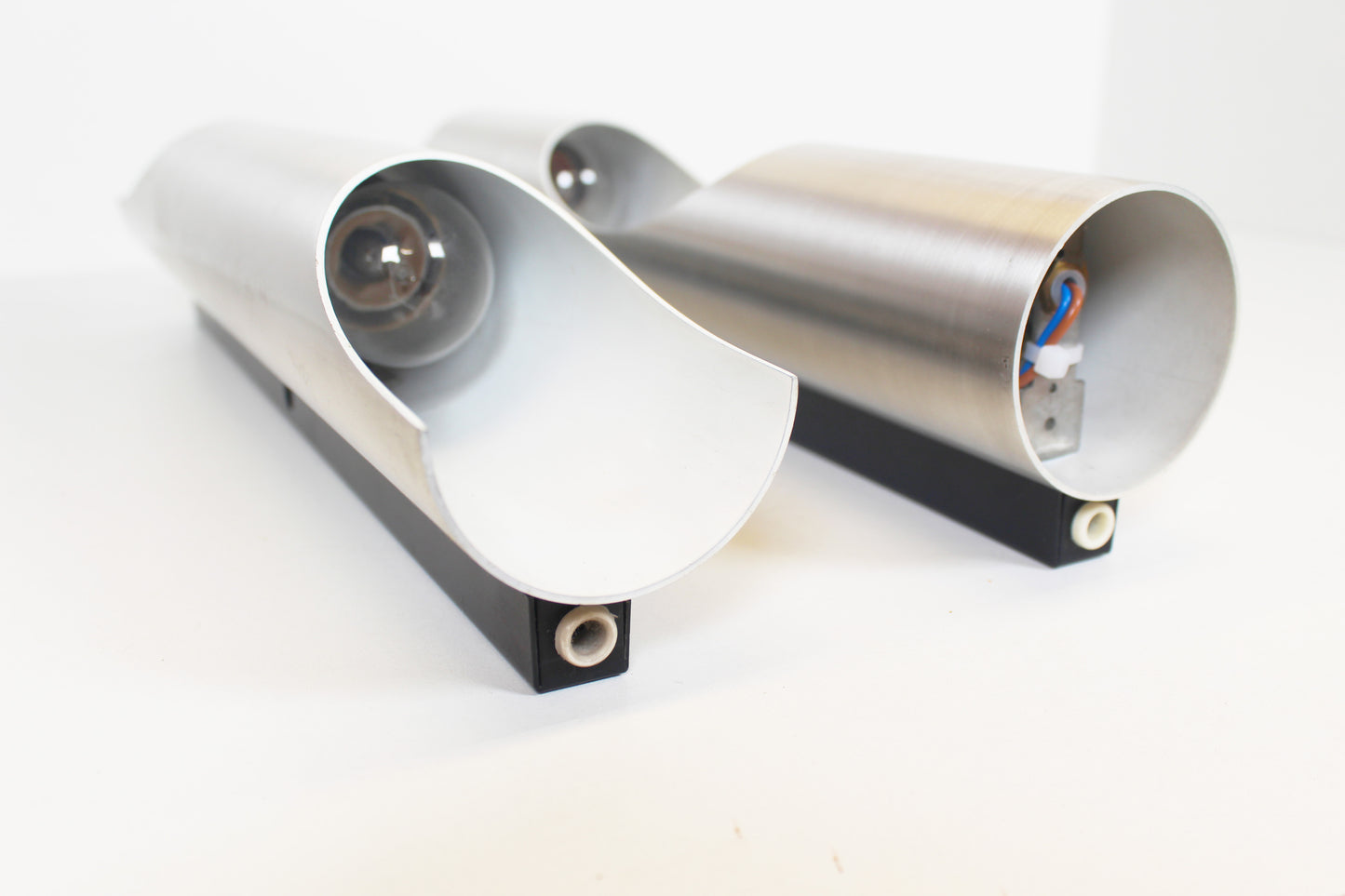 Pair of 70s 'FUGA' wall lamps by RAAK