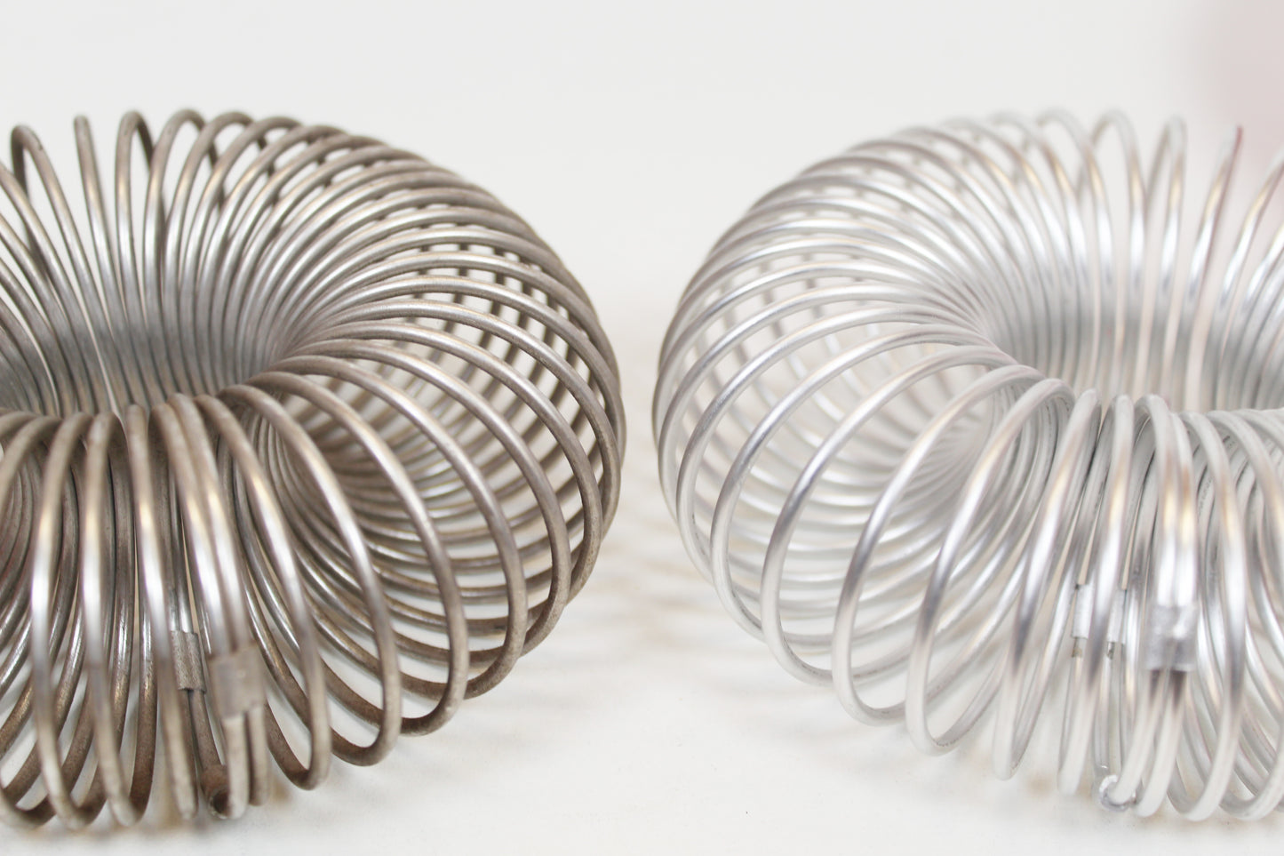 Pair of Space Age 'Spring' wall lamps by ELEKTROFÉM, Hungary, 1970s.