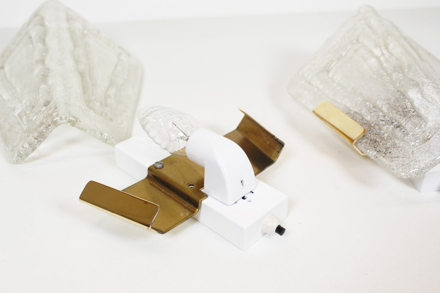 Pair of 1970s ice glass and brass wall lamps by Hillebrand