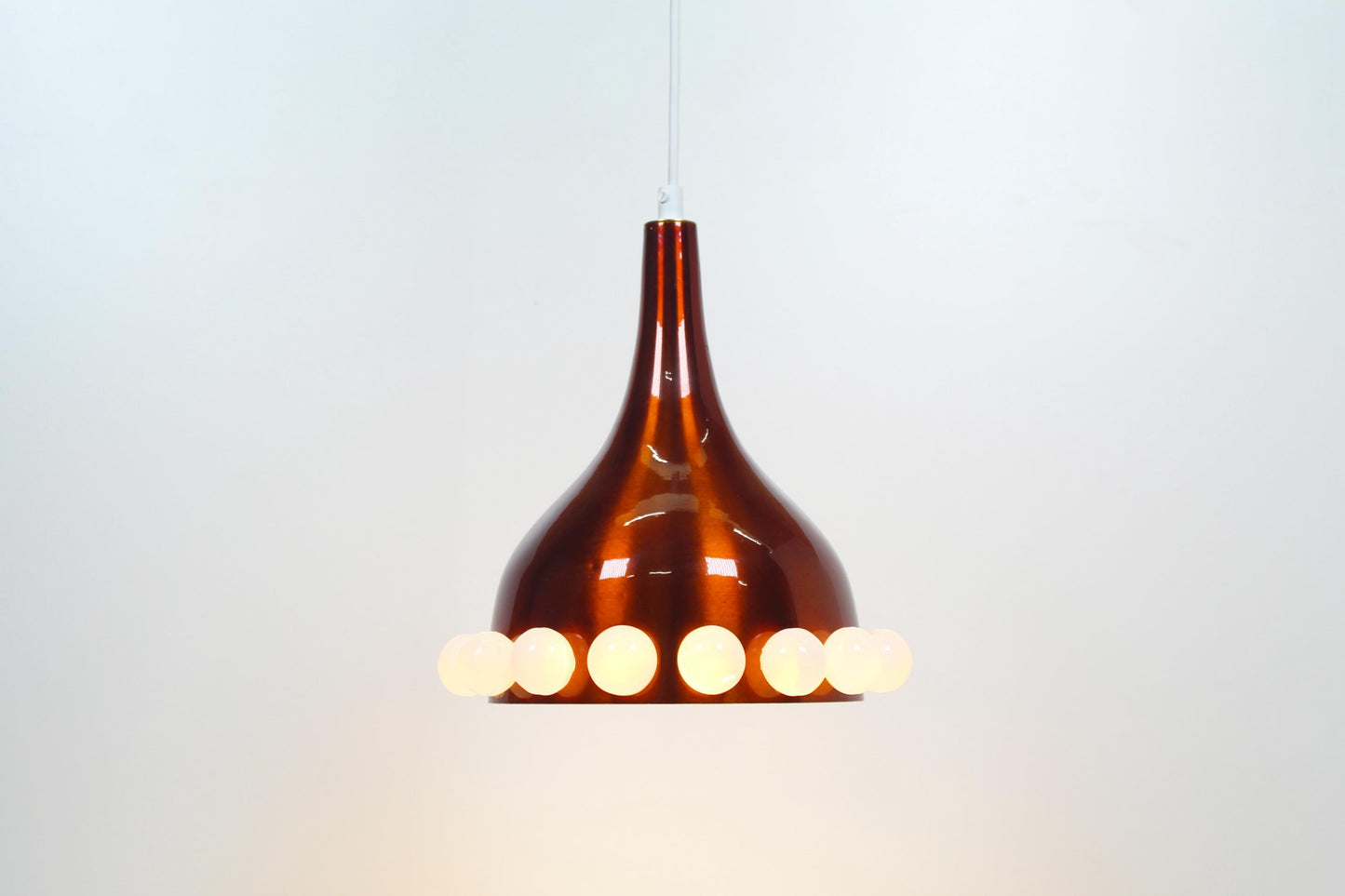 Scandinavian brass and glass pendant lights