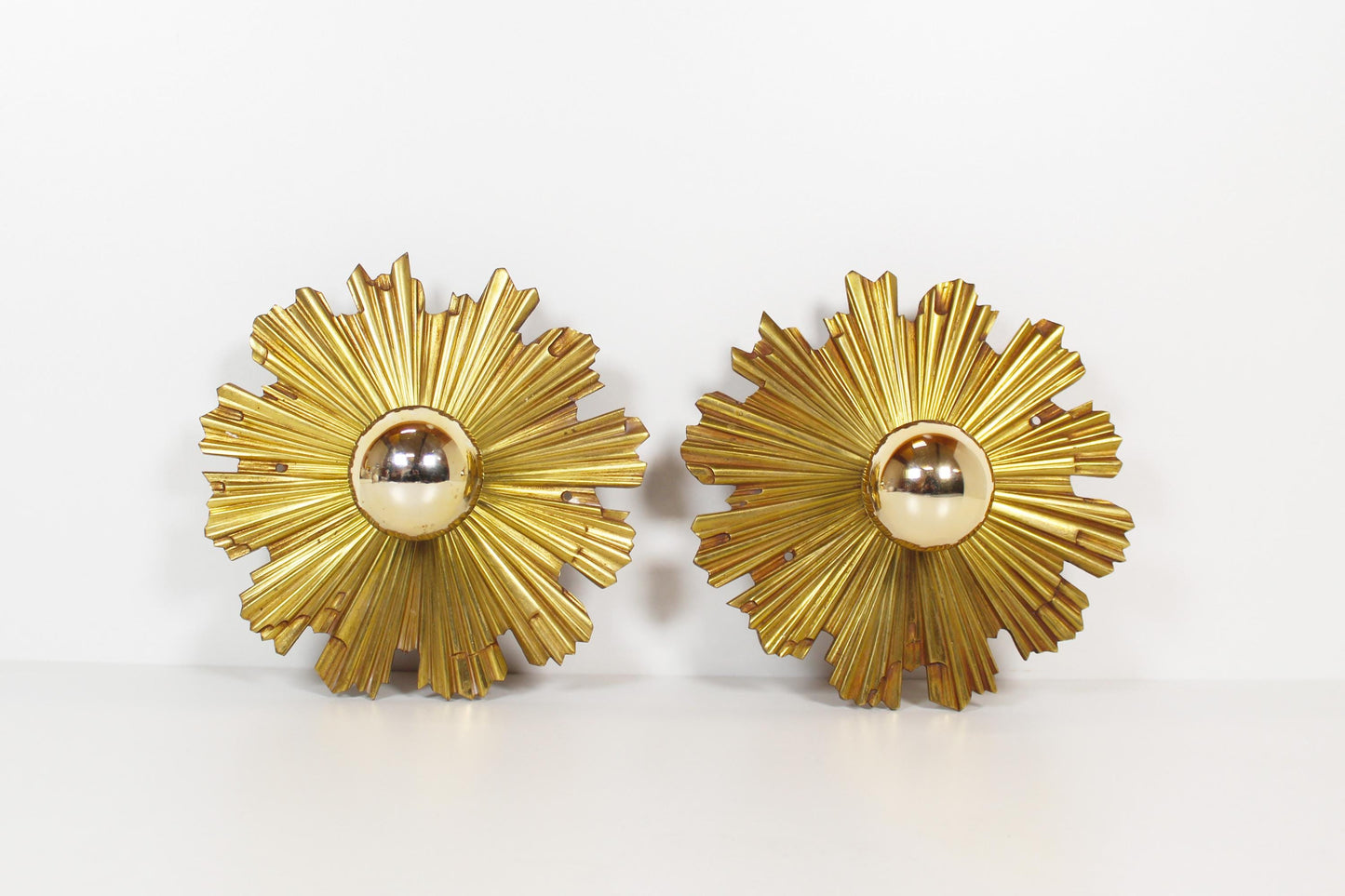 Set of solid bronze 1950s Sunburst wall lamps