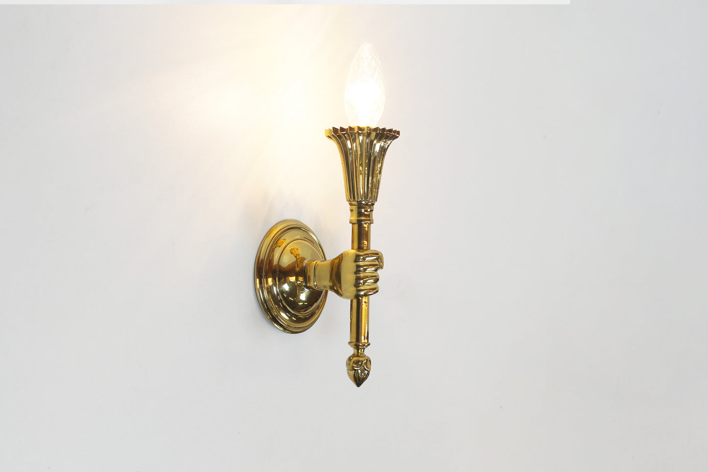 Pair of 'torch' wall lamps in the style of Maison Jansen