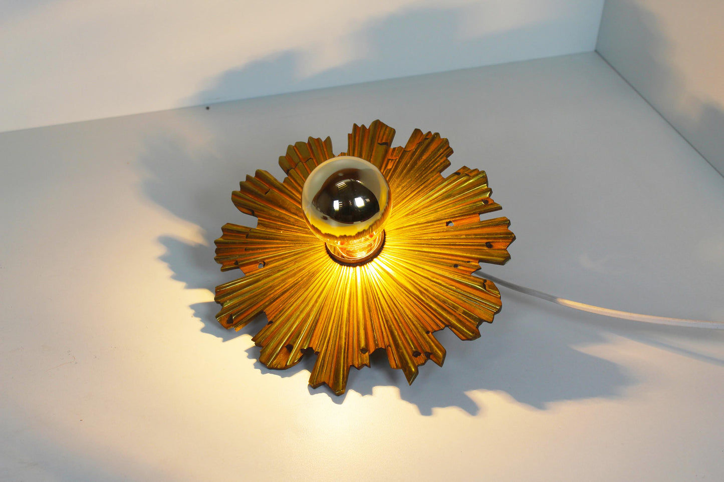 Set of solid bronze 1950s Sunburst wall lamps