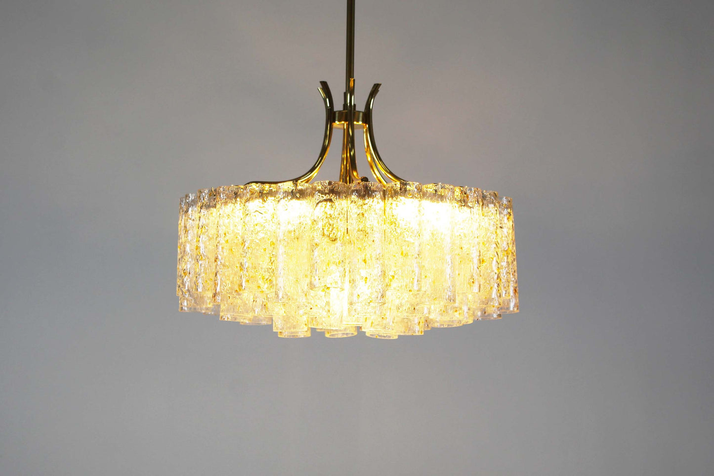 Large chandelier in brass and 'goldflake' glass by Doria Leuchten