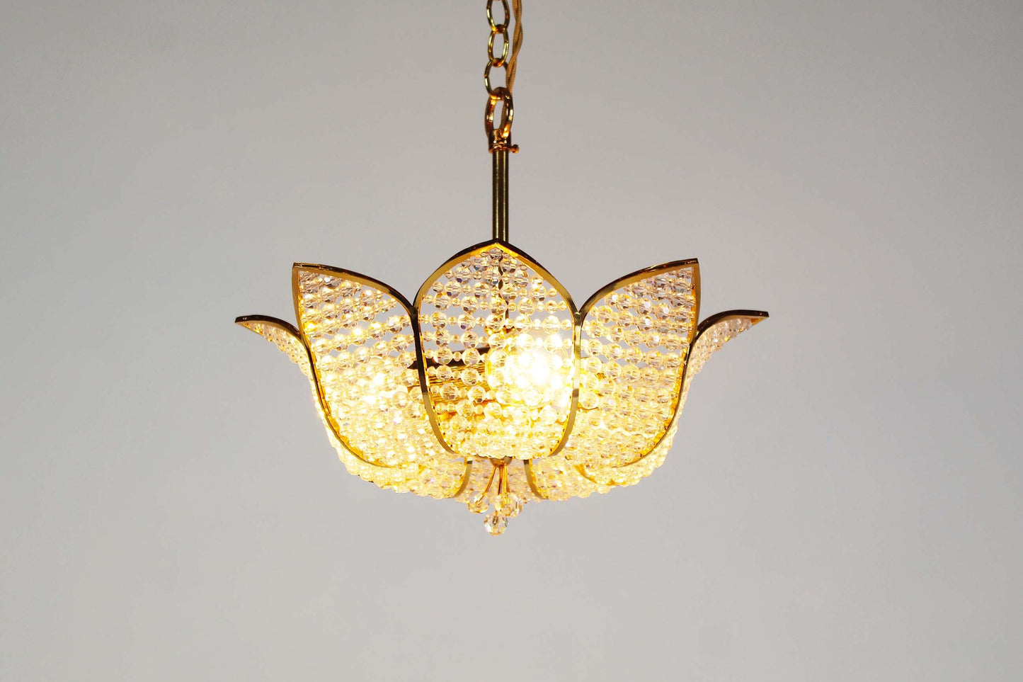Chandelier in gilt brass and crystal glass by Palwa